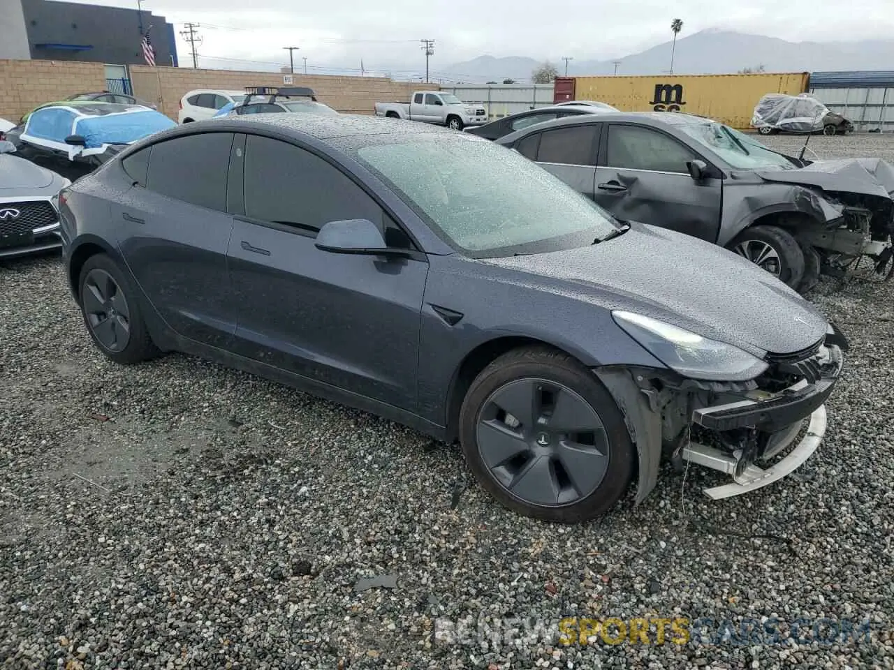 4 Photograph of a damaged car 5YJ3E1EB1NF112040 TESLA MODEL 3 2022