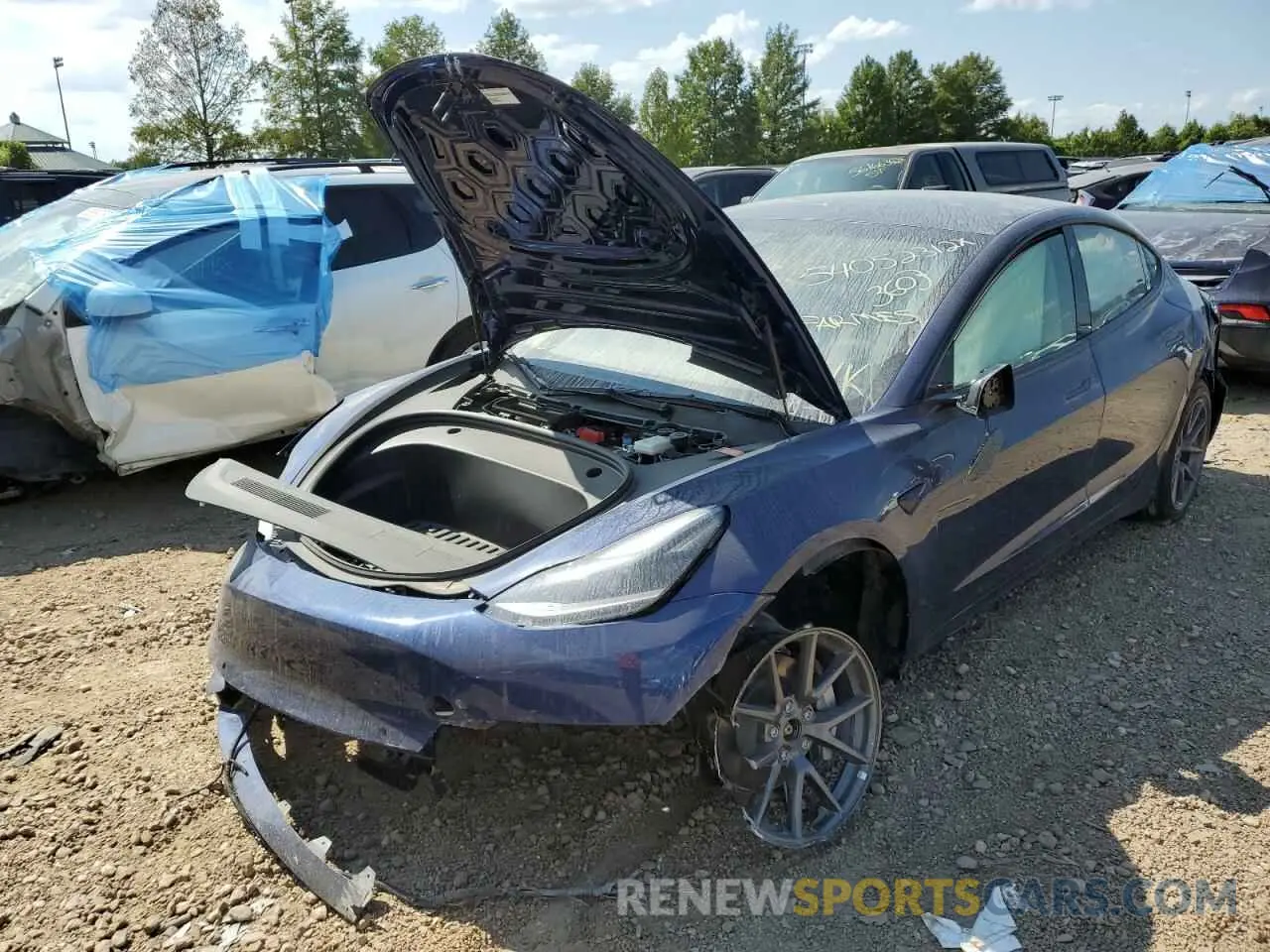 2 Photograph of a damaged car 5YJ3E1EB1NF114712 TESLA MODEL 3 2022