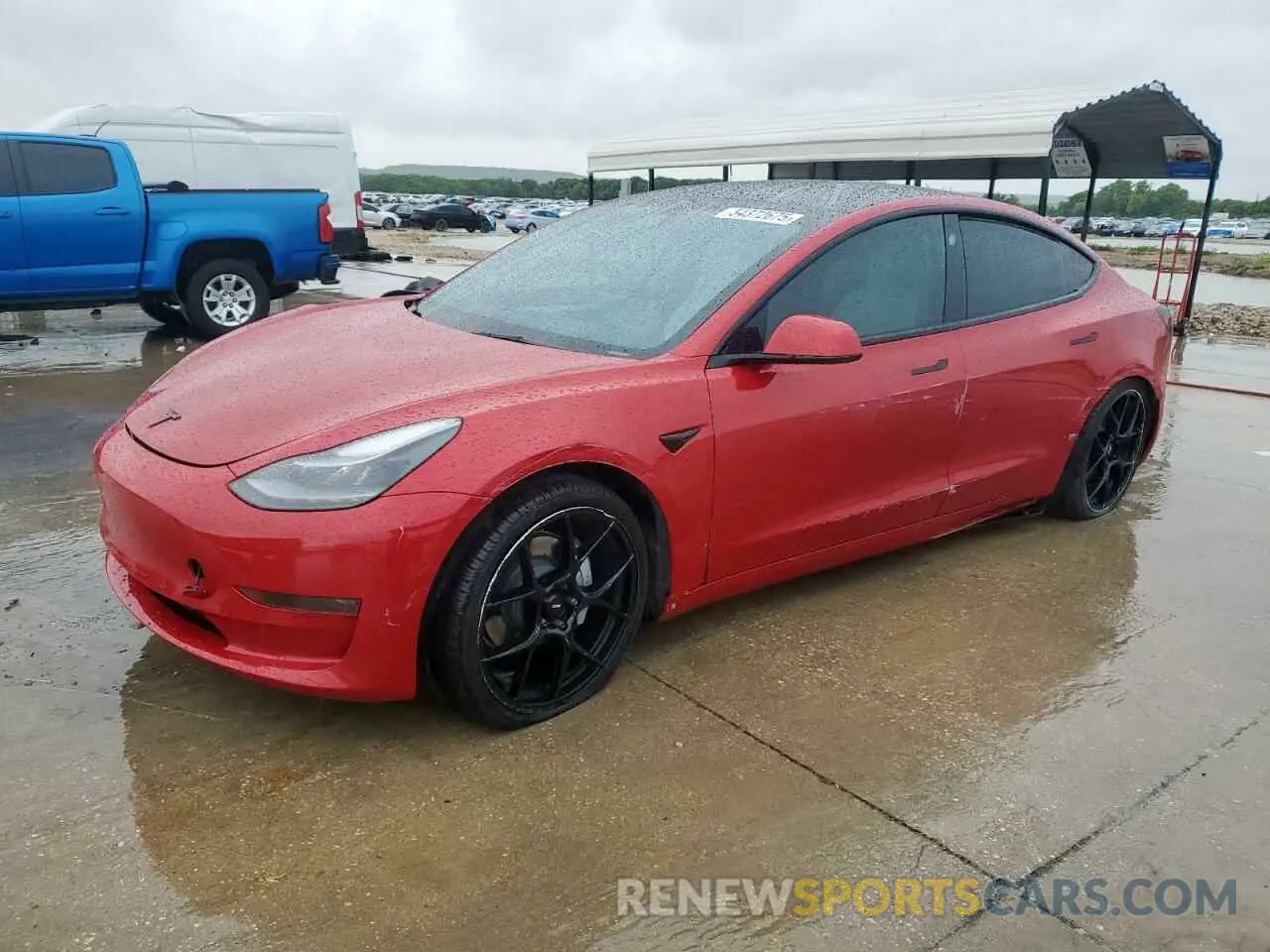 1 Photograph of a damaged car 5YJ3E1EB1NF115200 TESLA MODEL 3 2022