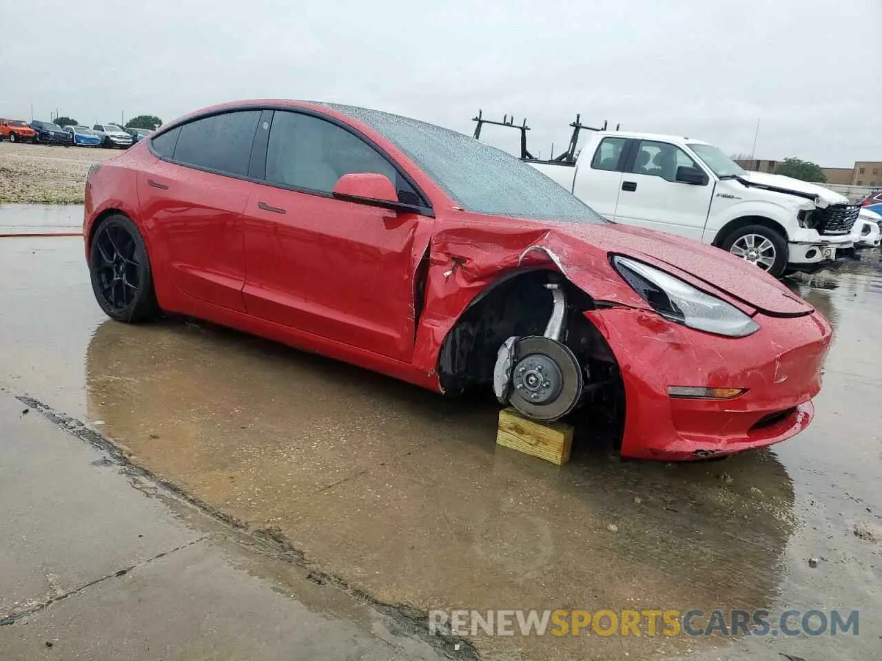 4 Photograph of a damaged car 5YJ3E1EB1NF115200 TESLA MODEL 3 2022