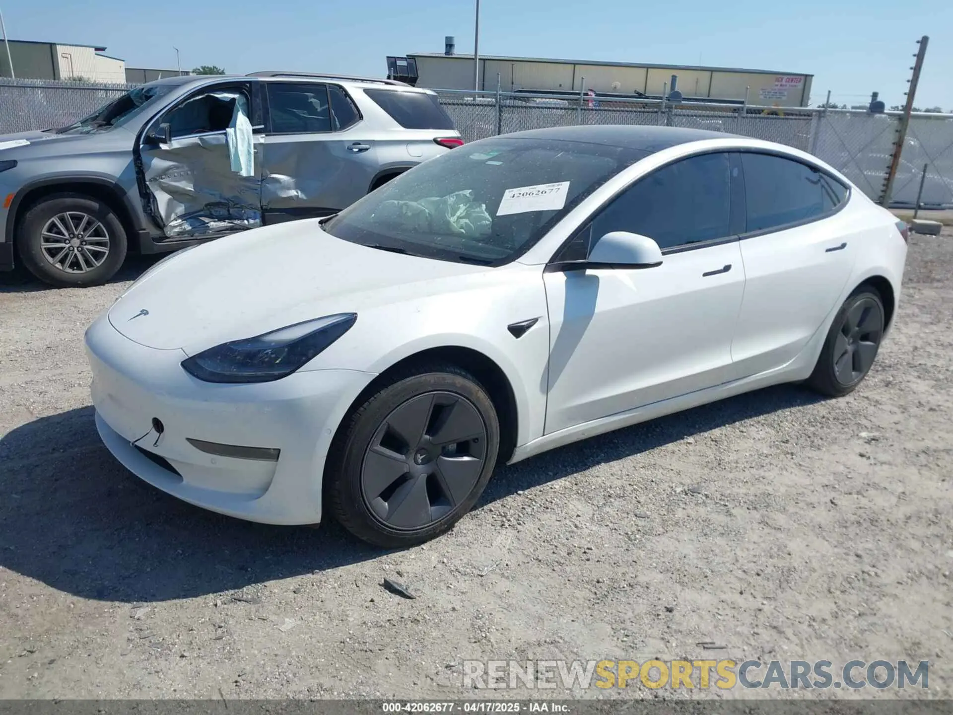 2 Photograph of a damaged car 5YJ3E1EB1NF116850 TESLA MODEL 3 2022