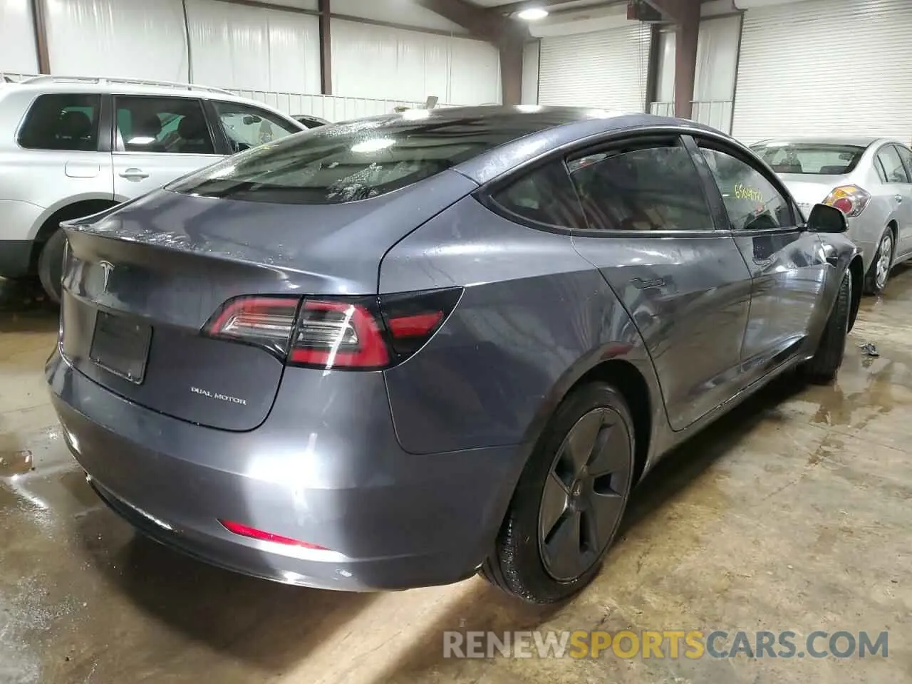 4 Photograph of a damaged car 5YJ3E1EB1NF121787 TESLA MODEL 3 2022