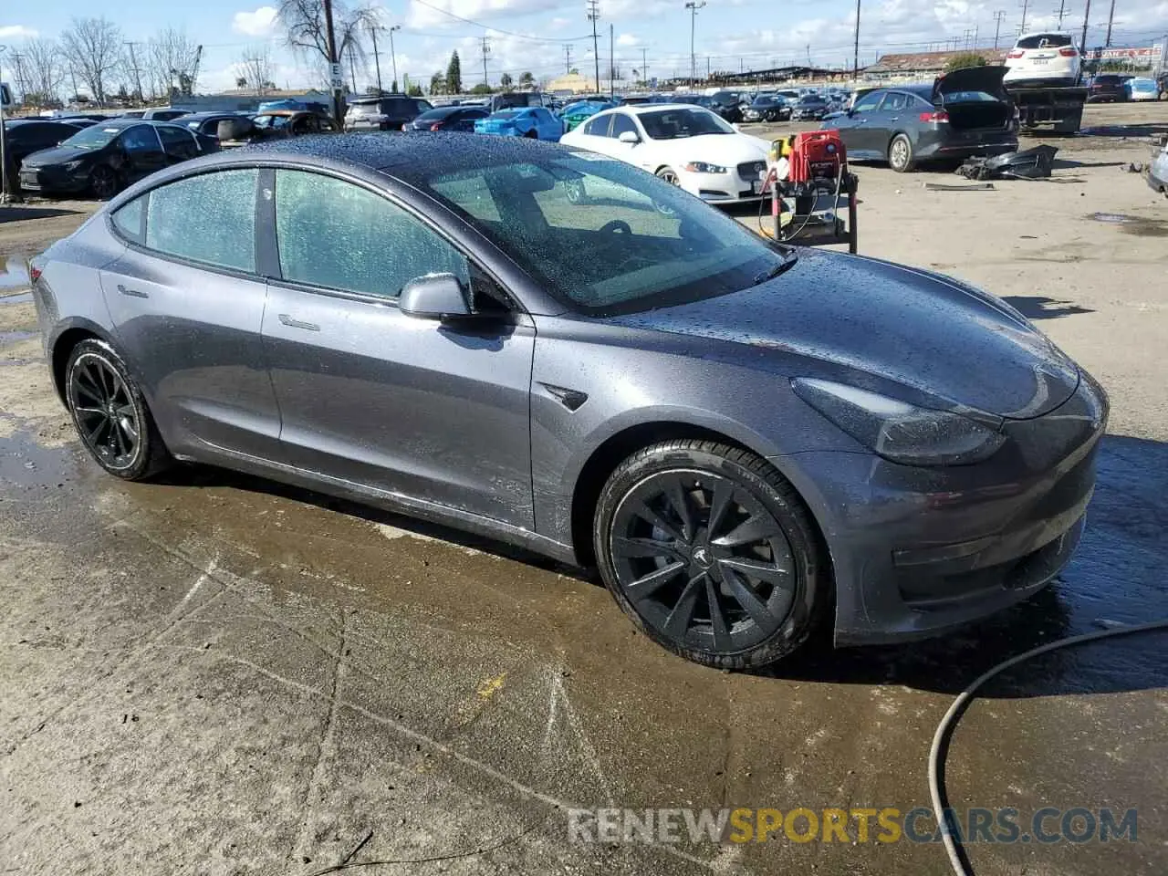 4 Photograph of a damaged car 5YJ3E1EB1NF125192 TESLA MODEL 3 2022