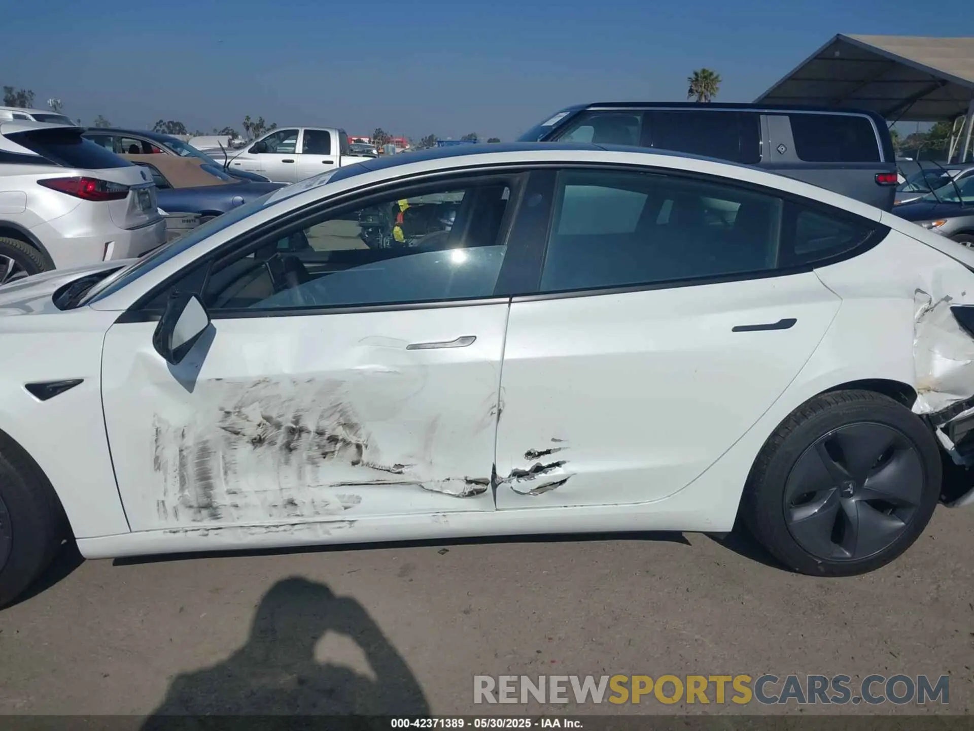 14 Фотография поврежденного автомобиля 5YJ3E1EB1NF332200 TESLA MODEL 3 2022