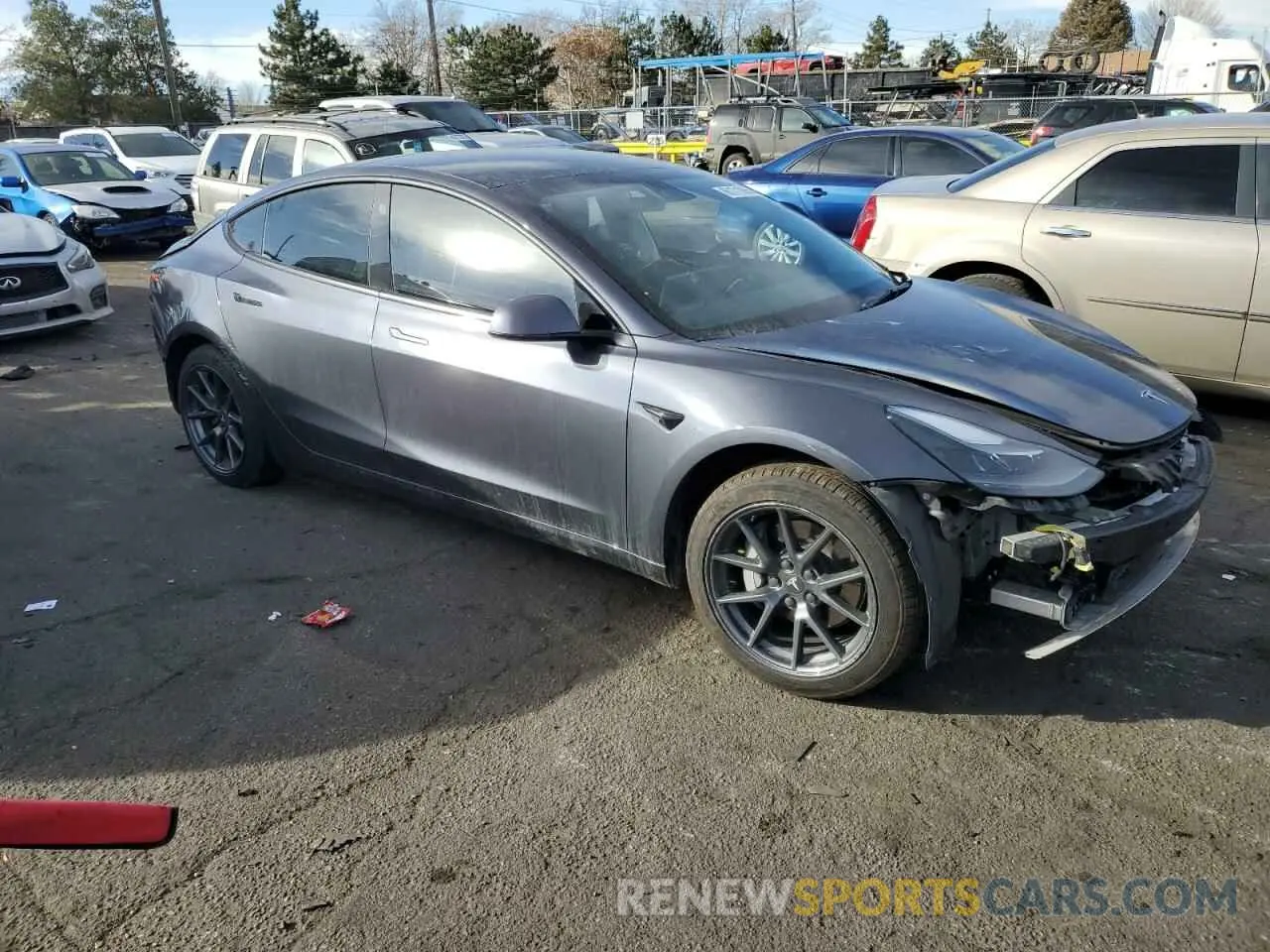4 Фотография поврежденного автомобиля 5YJ3E1EB2NF127517 TESLA MODEL 3 2022
