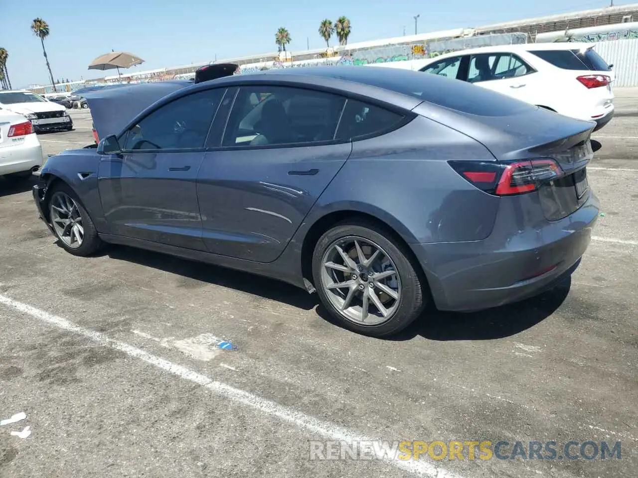 2 Photograph of a damaged car 5YJ3E1EB2NF132703 TESLA MODEL 3 2022