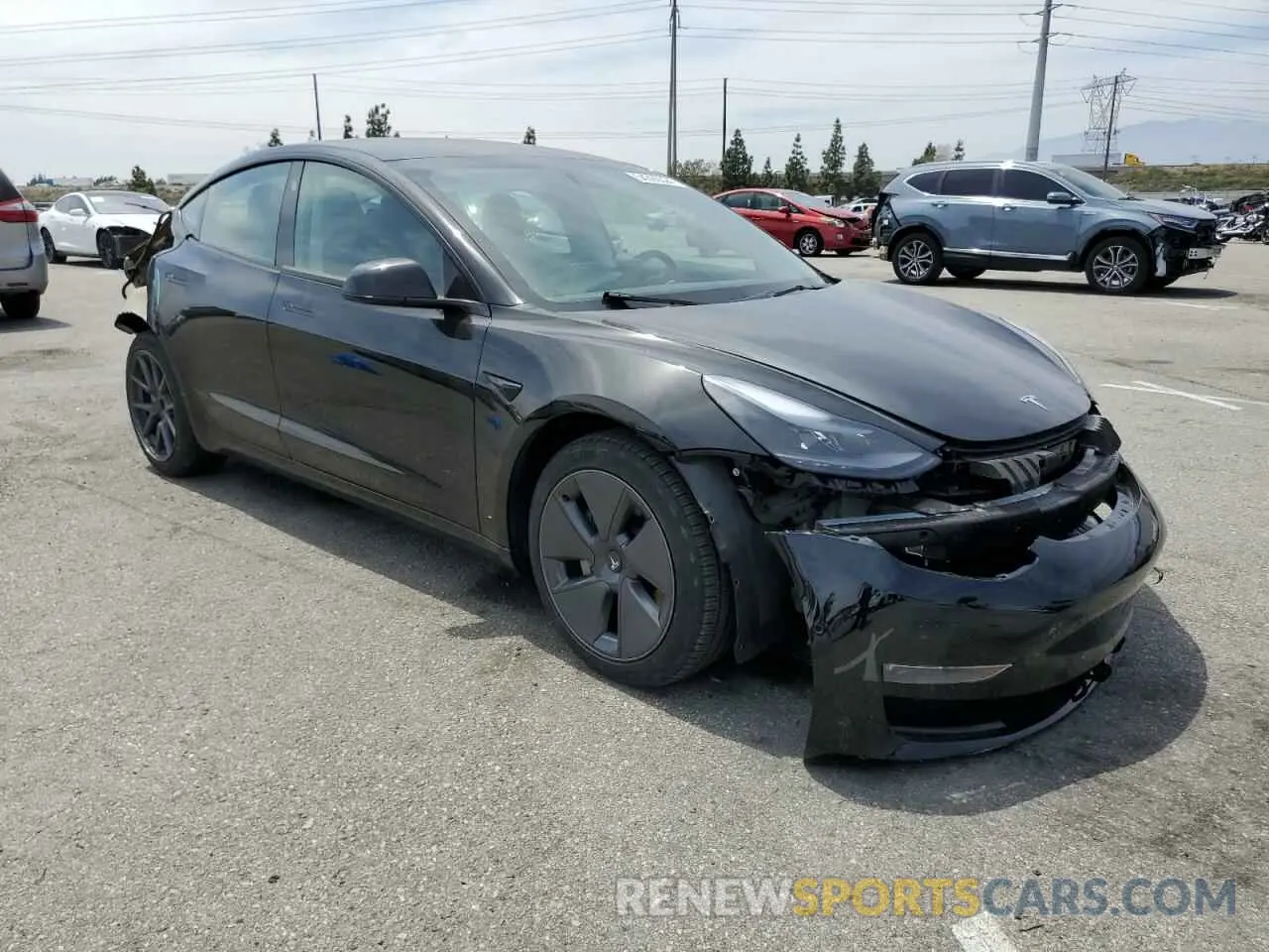 4 Photograph of a damaged car 5YJ3E1EB2NF138095 TESLA MODEL 3 2022