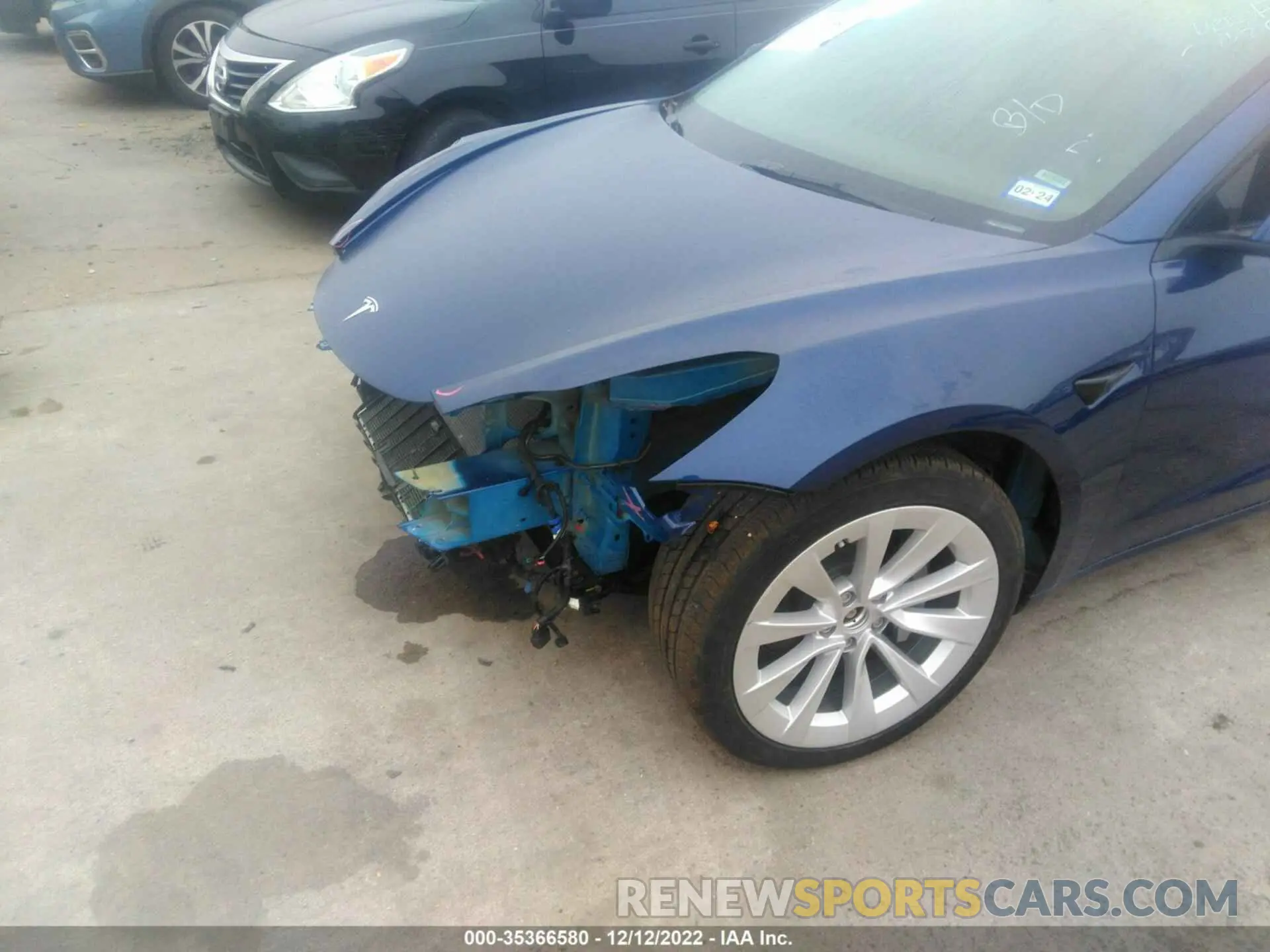6 Photograph of a damaged car 5YJ3E1EB2NF183277 TESLA MODEL 3 2022