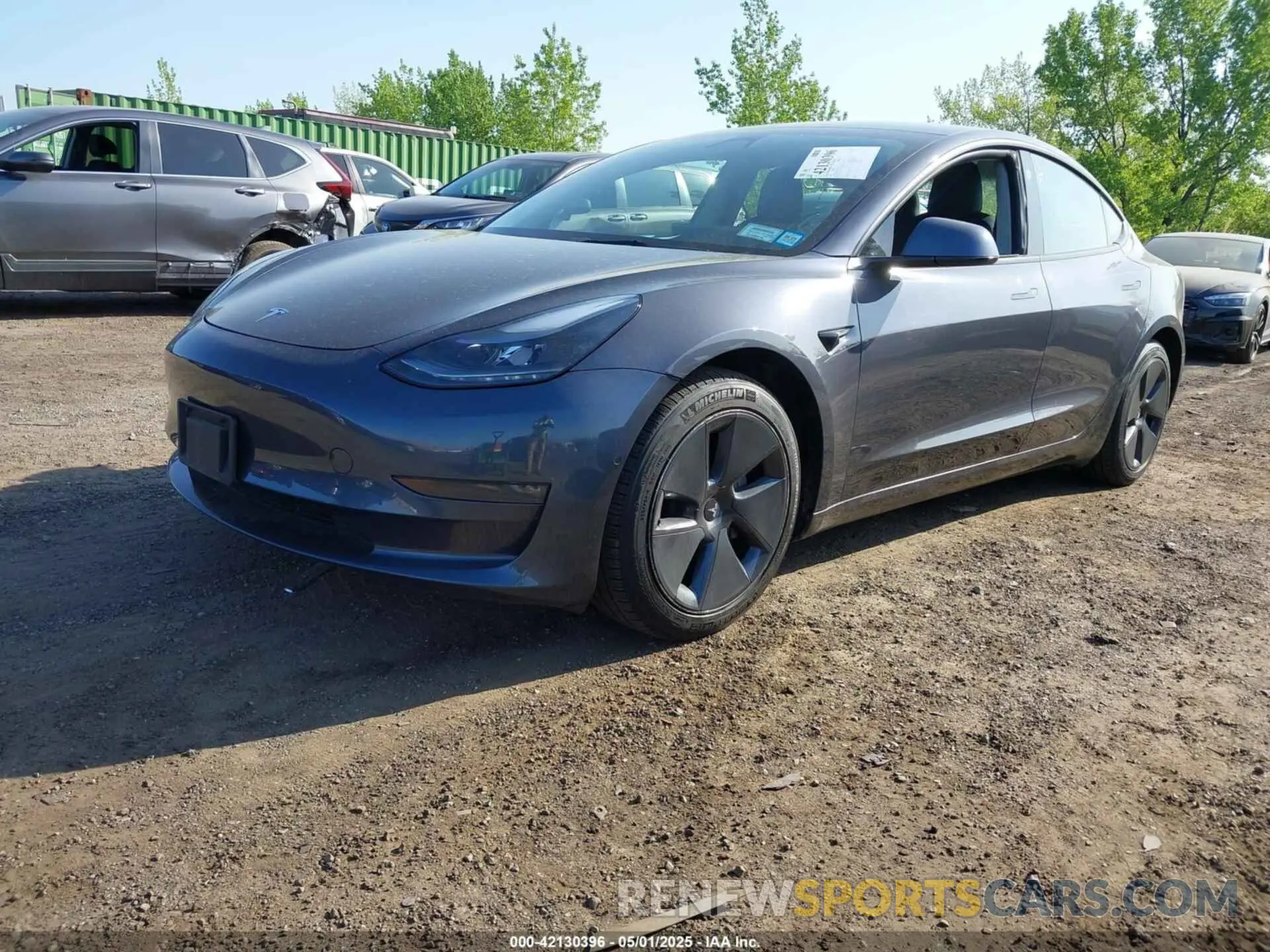 2 Photograph of a damaged car 5YJ3E1EB2NF183893 TESLA MODEL 3 2022