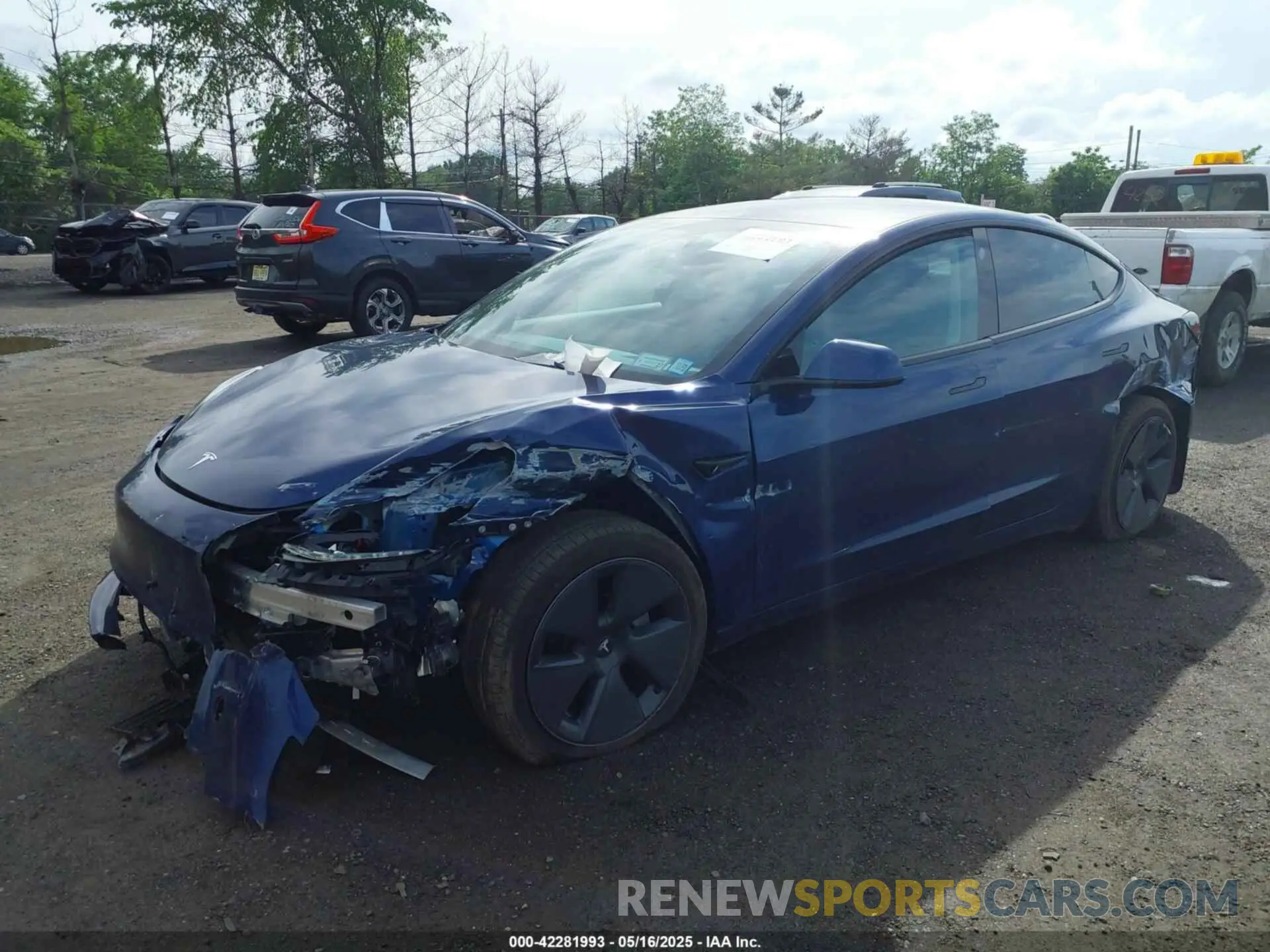 2 Photograph of a damaged car 5YJ3E1EB2NF193808 TESLA MODEL 3 2022