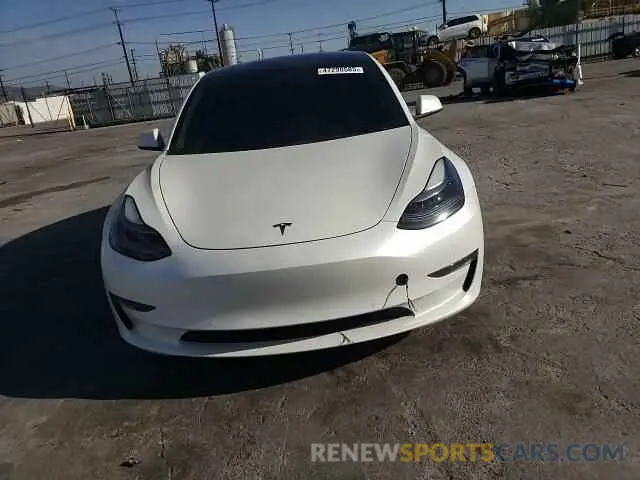 11 Фотография поврежденного автомобиля 5YJ3E1EB2NF210008 TESLA MODEL 3 2022