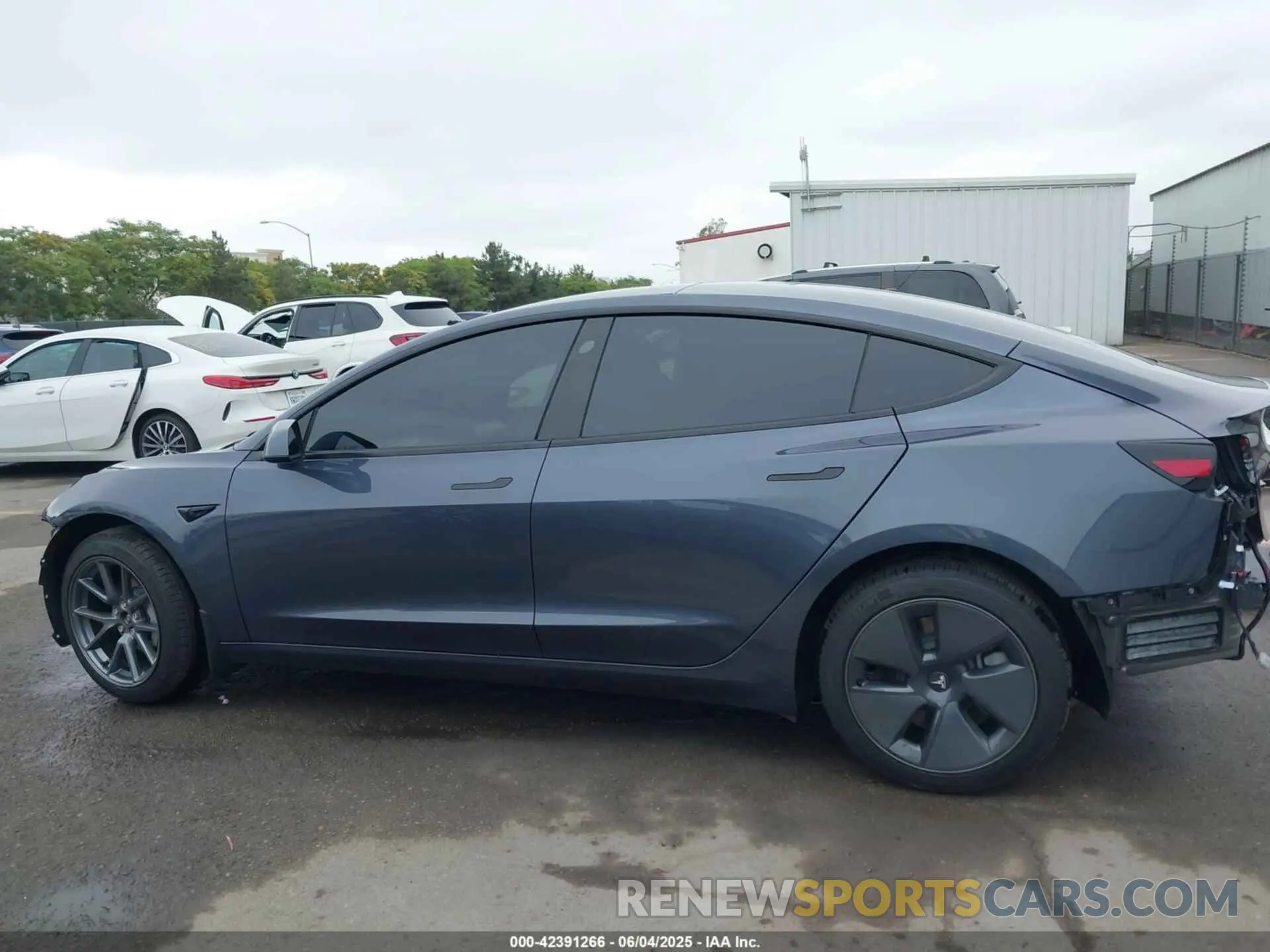 14 Photograph of a damaged car 5YJ3E1EB2NF259483 TESLA MODEL 3 2022