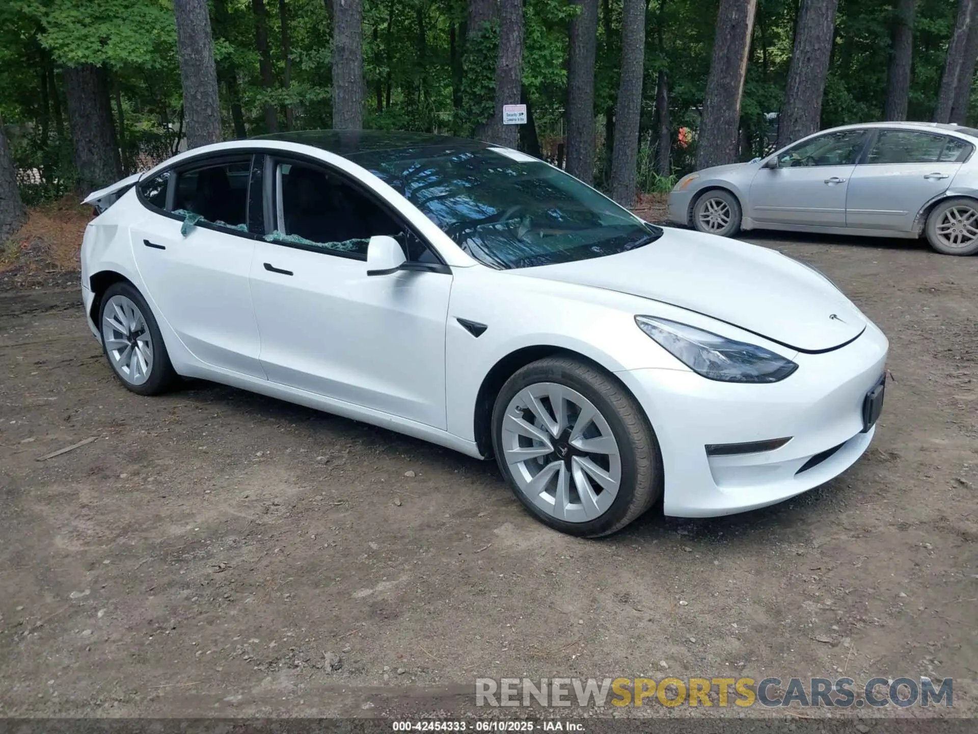 1 Photograph of a damaged car 5YJ3E1EB2NF359485 TESLA MODEL 3 2022