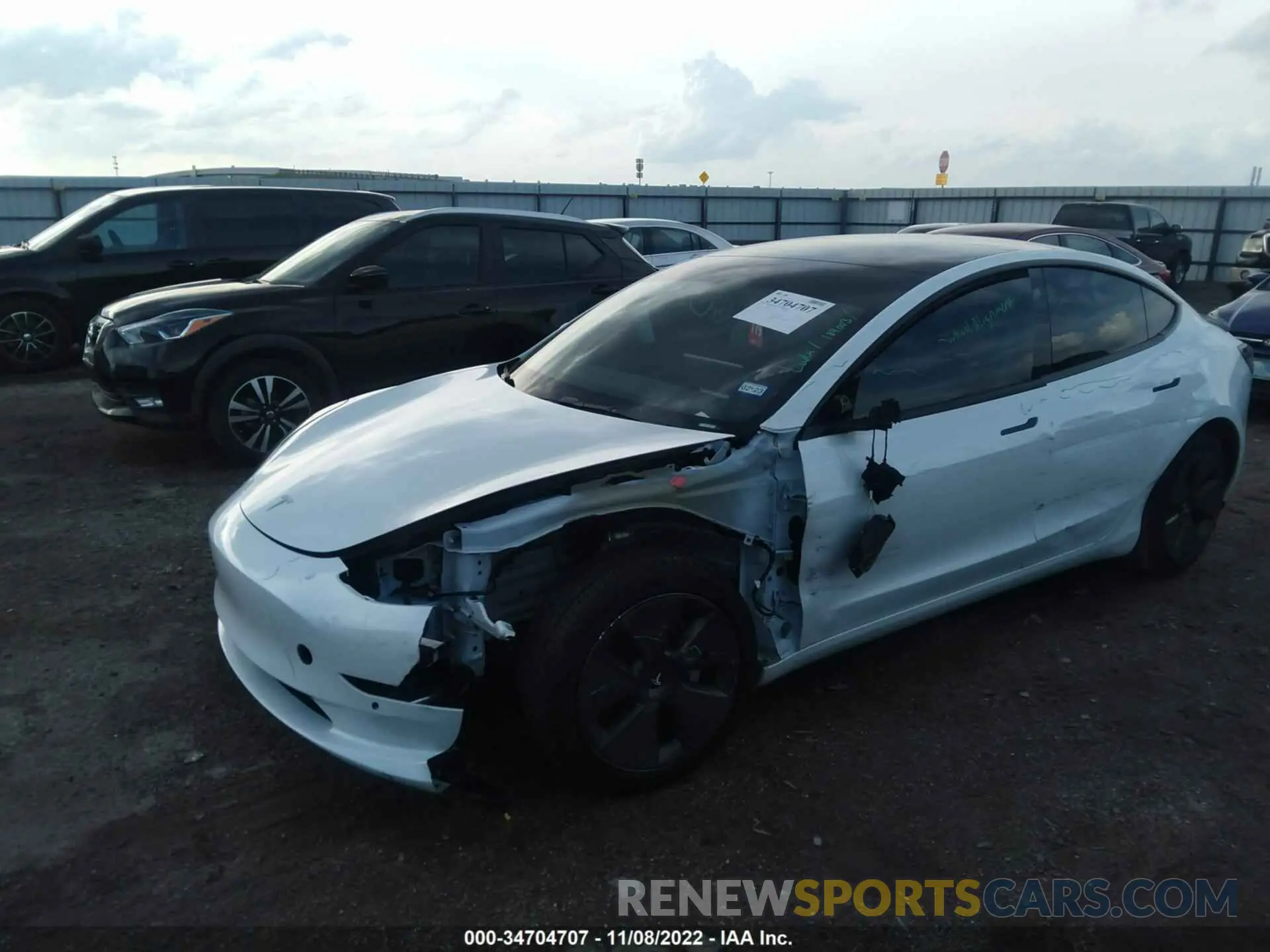 2 Photograph of a damaged car 5YJ3E1EB3NF184003 TESLA MODEL 3 2022