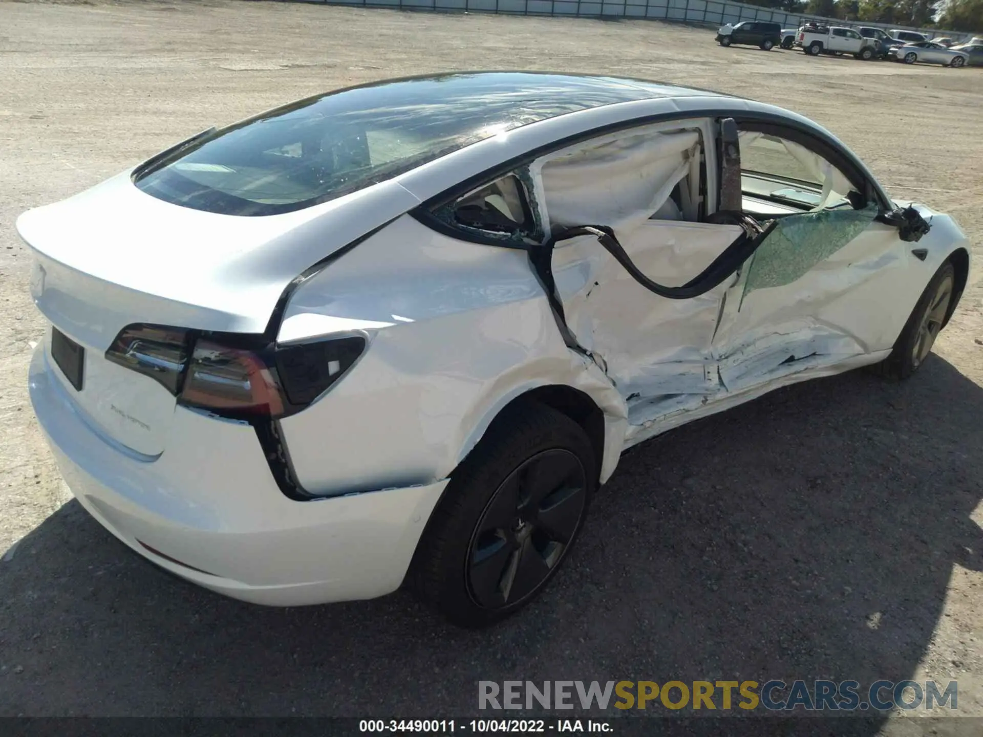 4 Photograph of a damaged car 5YJ3E1EB3NF184440 TESLA MODEL 3 2022