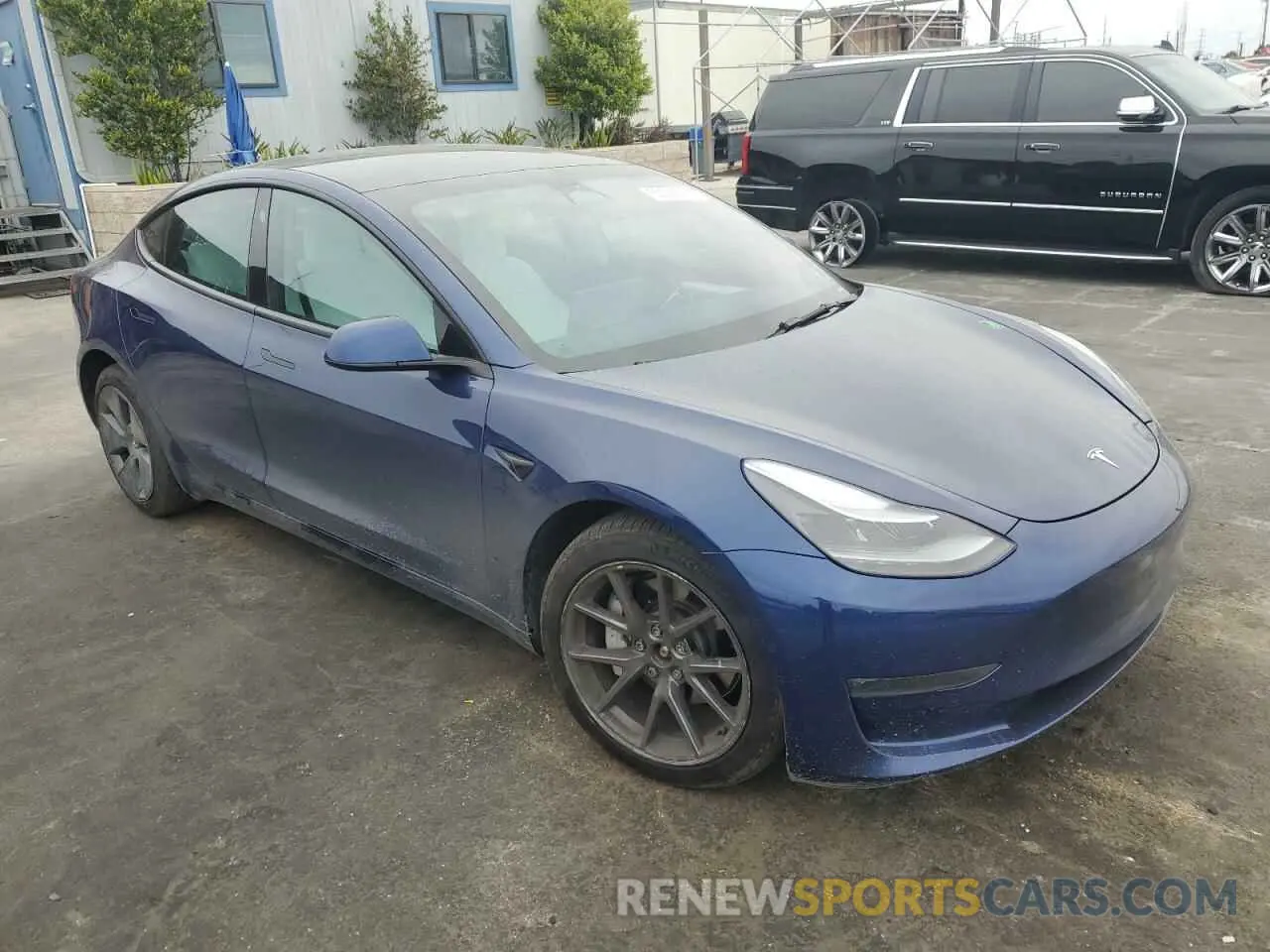 4 Photograph of a damaged car 5YJ3E1EB3NF195681 TESLA MODEL 3 2022