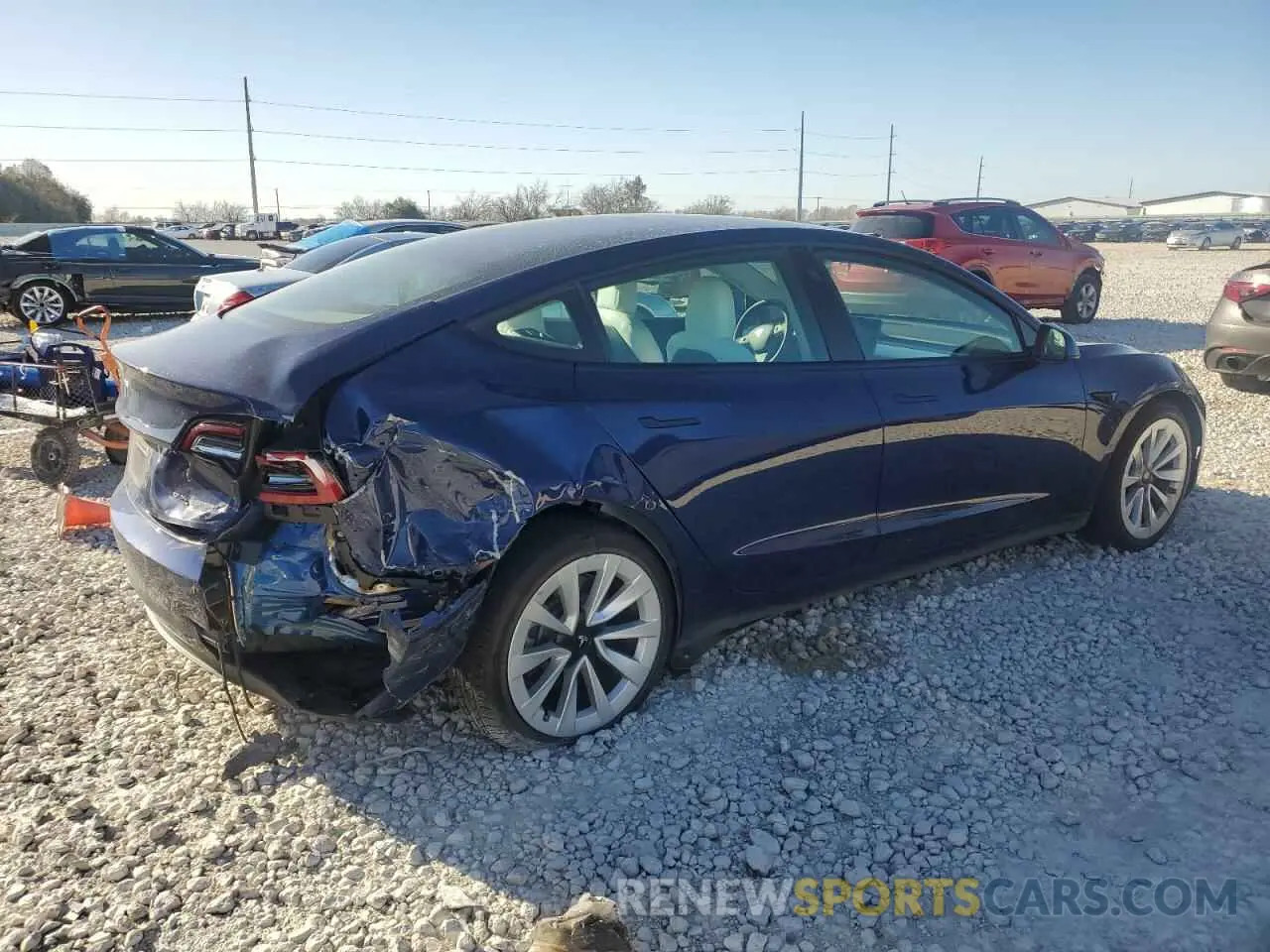3 Photograph of a damaged car 5YJ3E1EB3NF198144 TESLA MODEL 3 2022