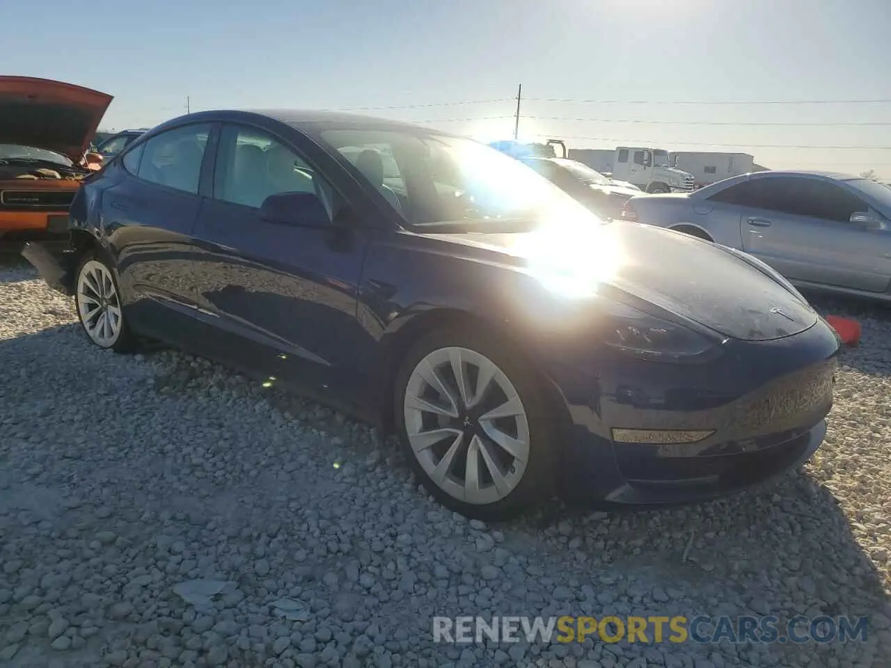 4 Photograph of a damaged car 5YJ3E1EB3NF198144 TESLA MODEL 3 2022