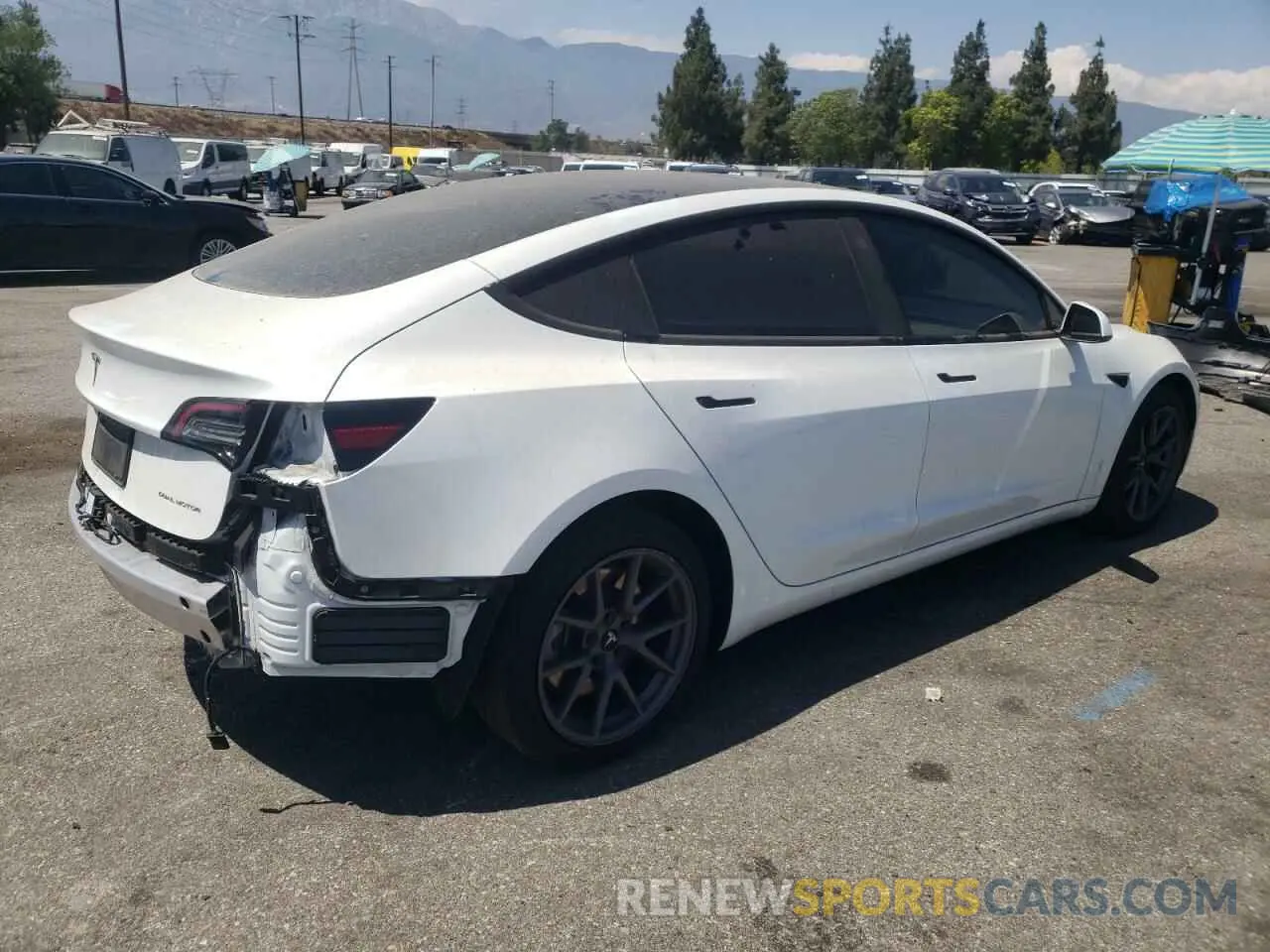 3 Photograph of a damaged car 5YJ3E1EB3NF211961 TESLA MODEL 3 2022