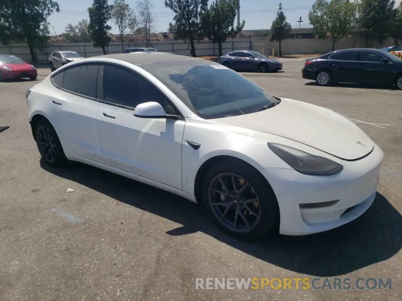 4 Photograph of a damaged car 5YJ3E1EB3NF211961 TESLA MODEL 3 2022