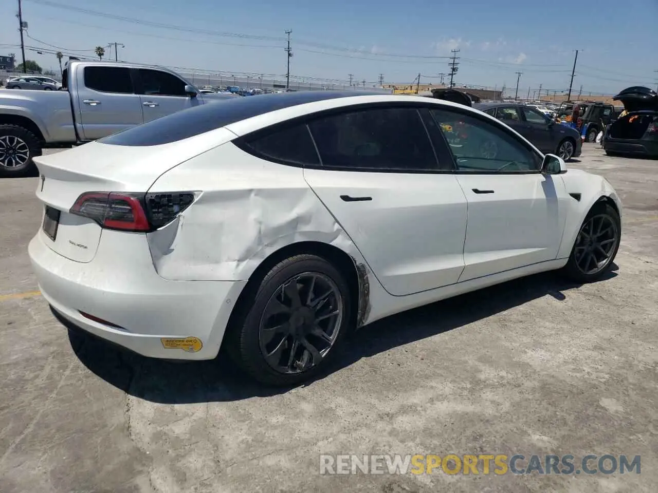 3 Photograph of a damaged car 5YJ3E1EB3NF253434 TESLA MODEL 3 2022