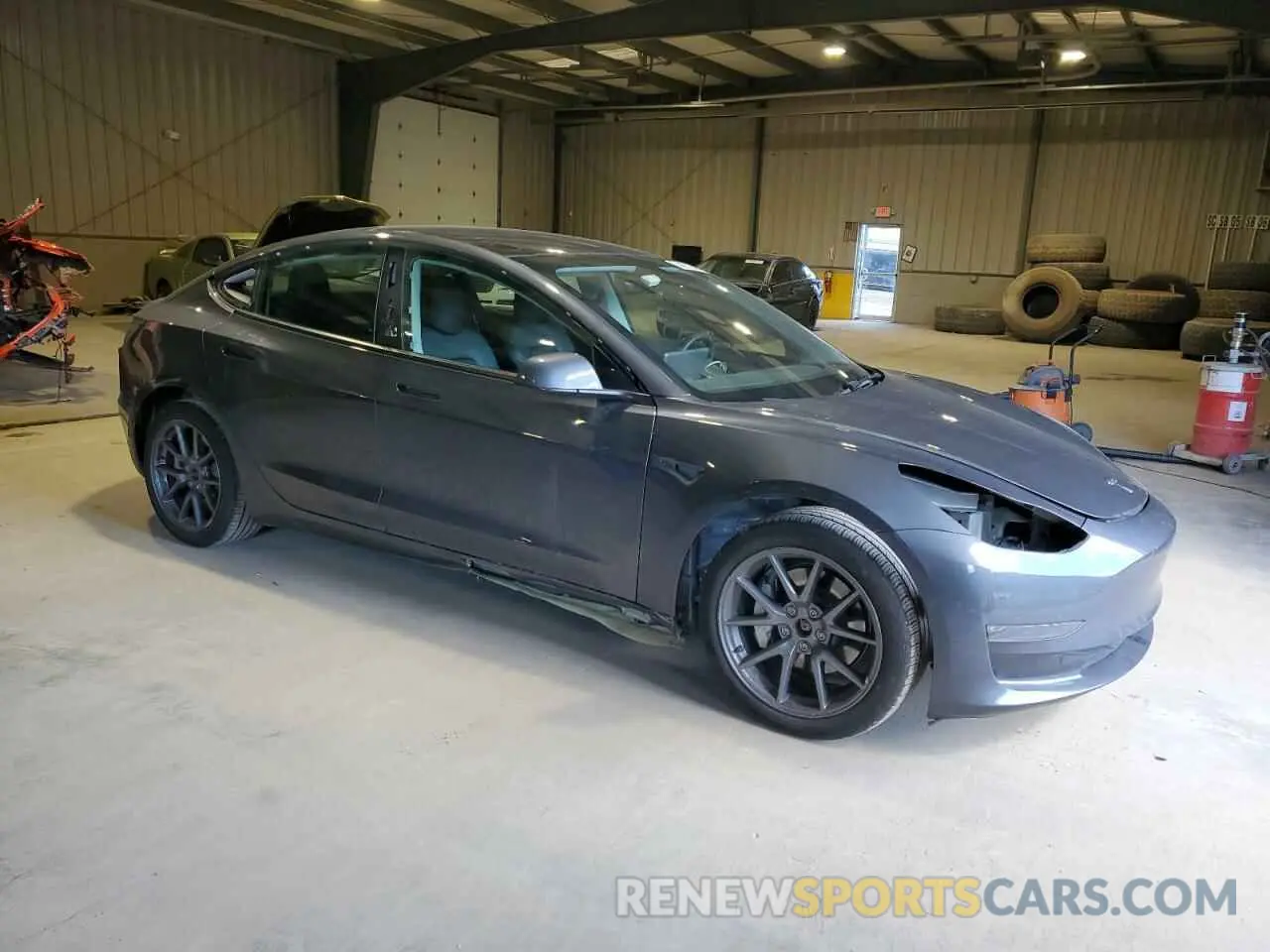 4 Photograph of a damaged car 5YJ3E1EB3NF276910 TESLA MODEL 3 2022