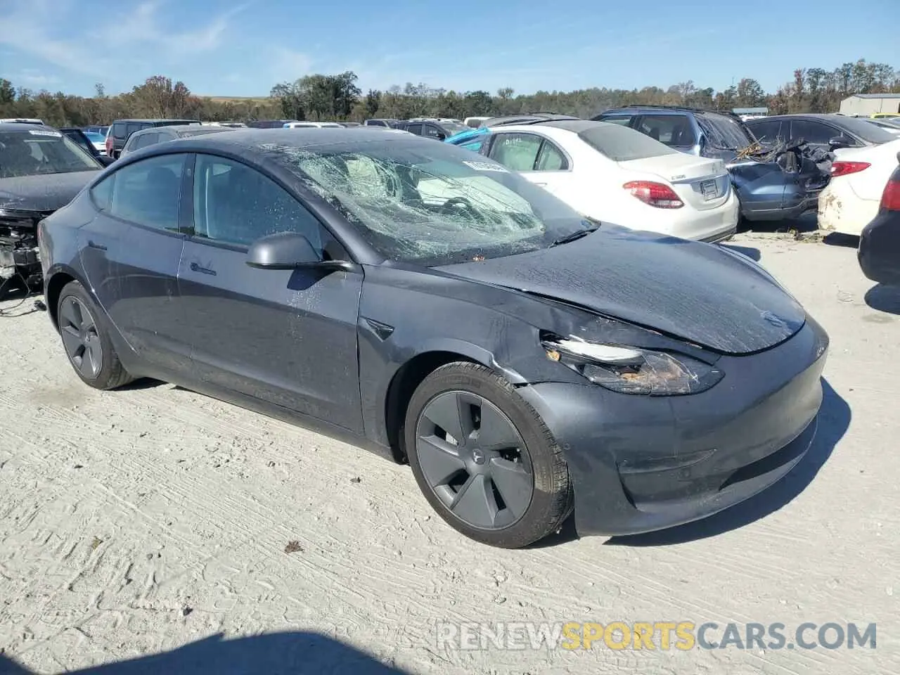 4 Photograph of a damaged car 5YJ3E1EB3NF277877 TESLA MODEL 3 2022