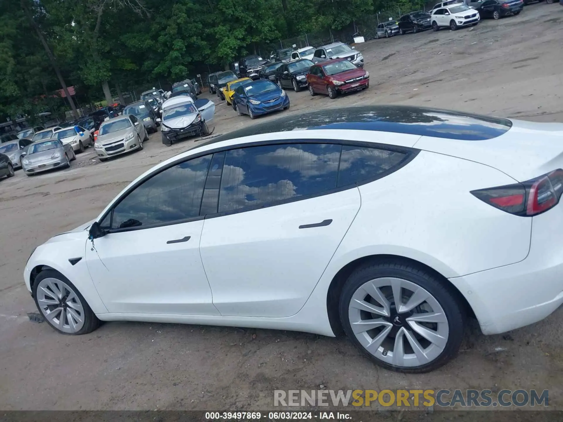 14 Photograph of a damaged car 5YJ3E1EB4NF169445 TESLA MODEL 3 2022