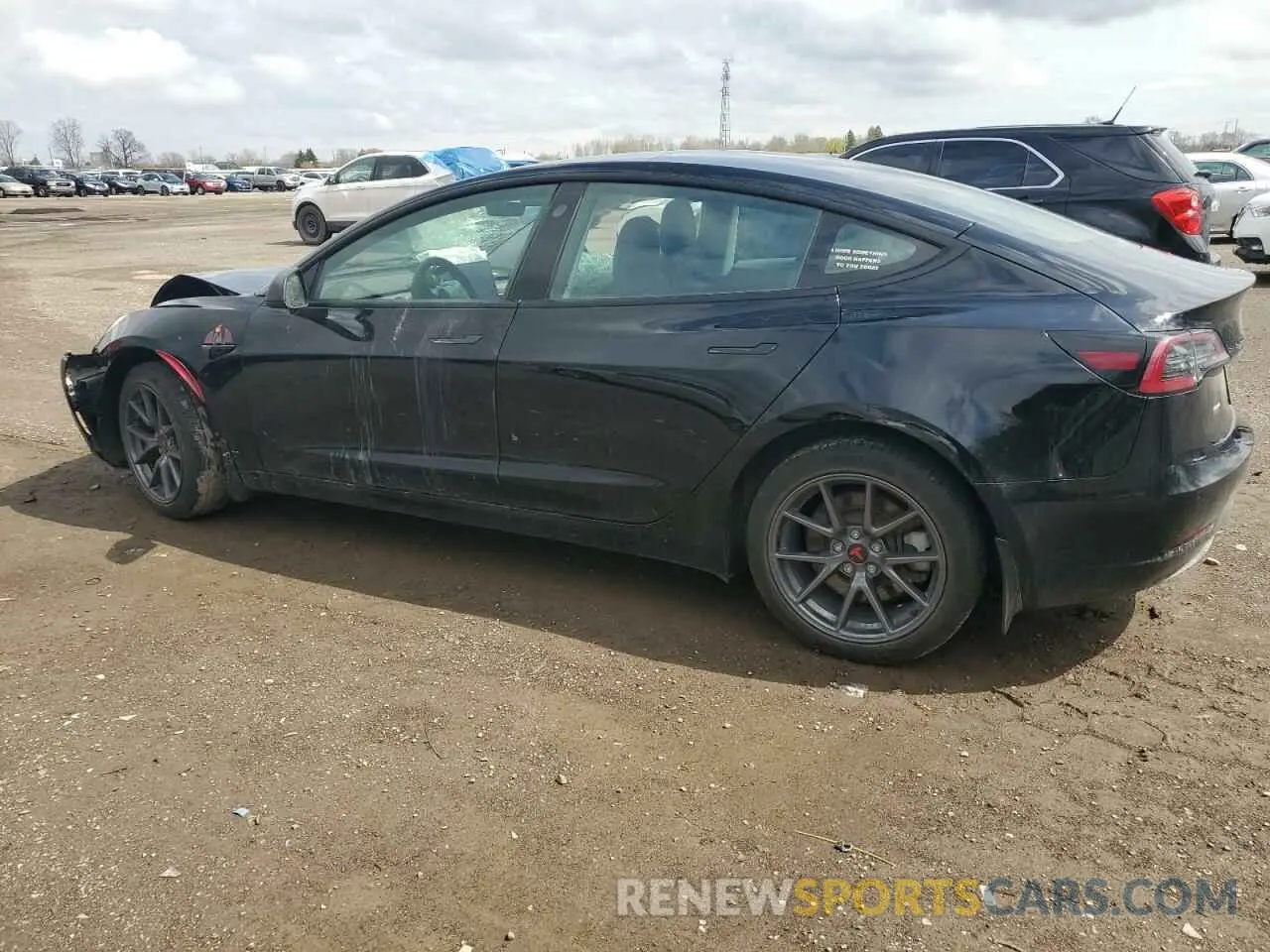 2 Photograph of a damaged car 5YJ3E1EB4NF179697 TESLA MODEL 3 2022