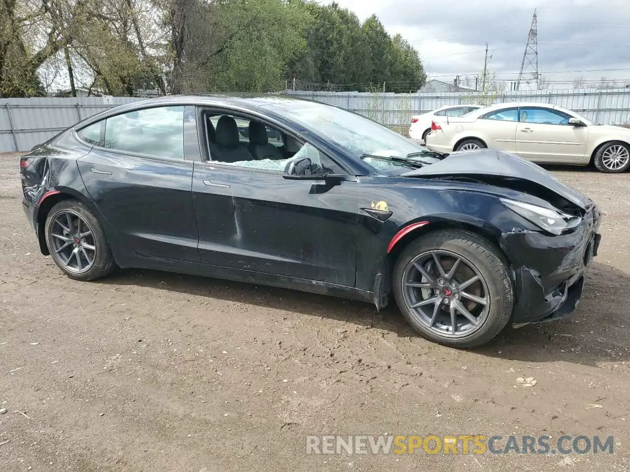 4 Photograph of a damaged car 5YJ3E1EB4NF179697 TESLA MODEL 3 2022
