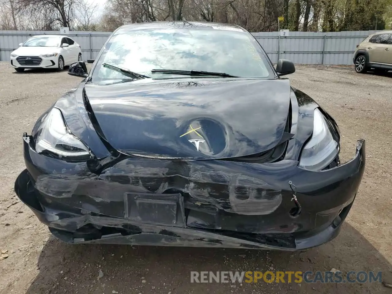 5 Photograph of a damaged car 5YJ3E1EB4NF179697 TESLA MODEL 3 2022