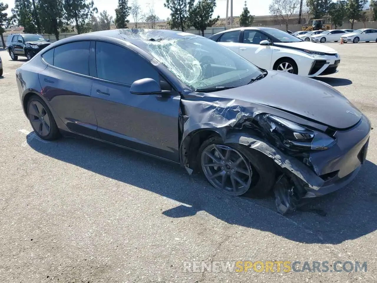 4 Photograph of a damaged car 5YJ3E1EB4NF186424 TESLA MODEL 3 2022