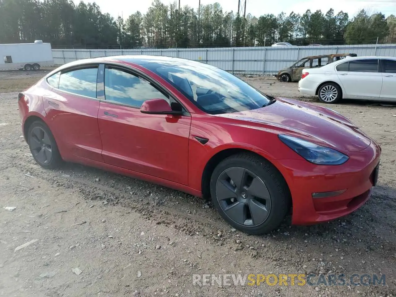 4 Photograph of a damaged car 5YJ3E1EB4NF257248 TESLA MODEL 3 2022