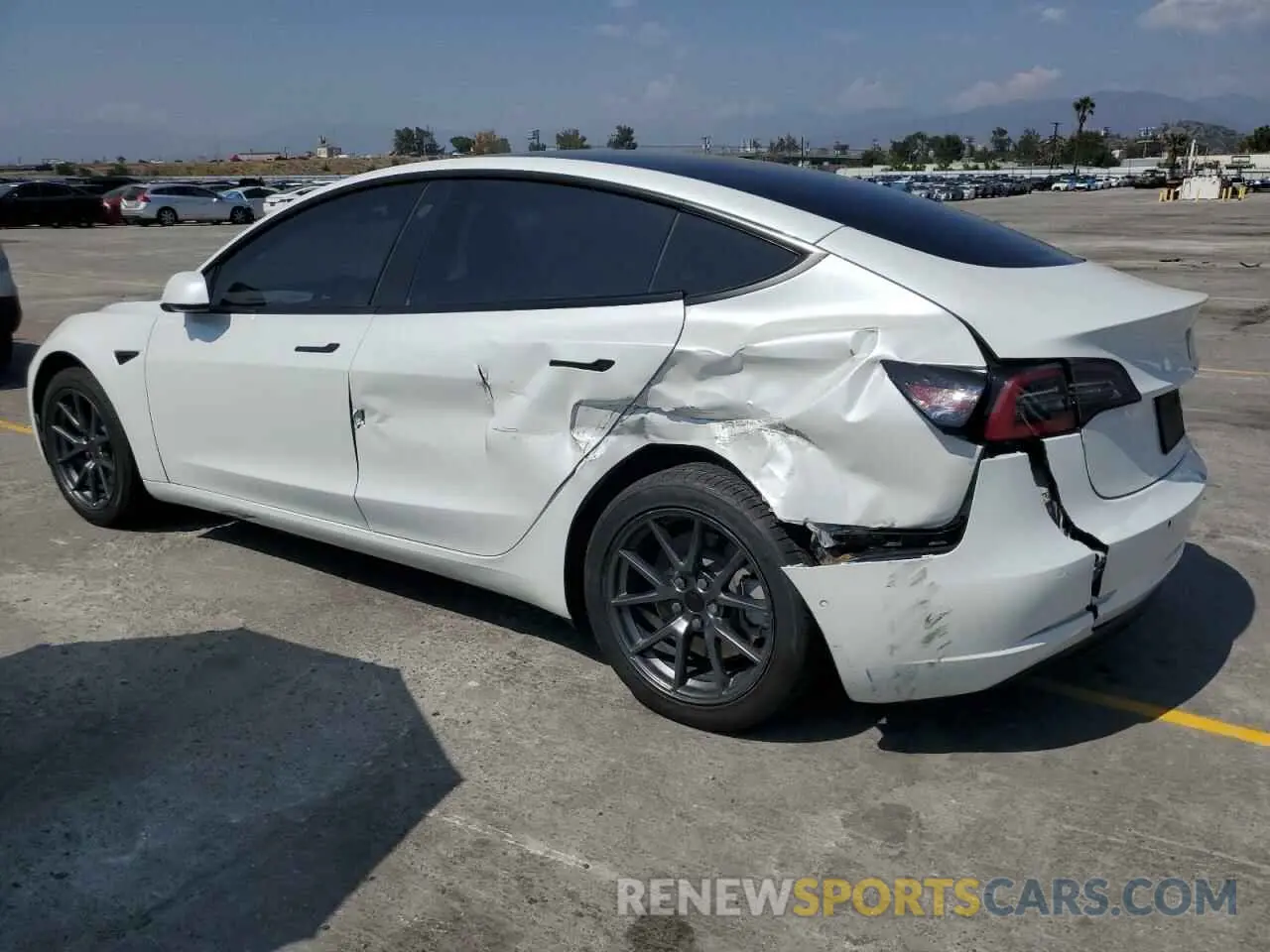 2 Фотография поврежденного автомобиля 5YJ3E1EB4NF332403 TESLA MODEL 3 2022