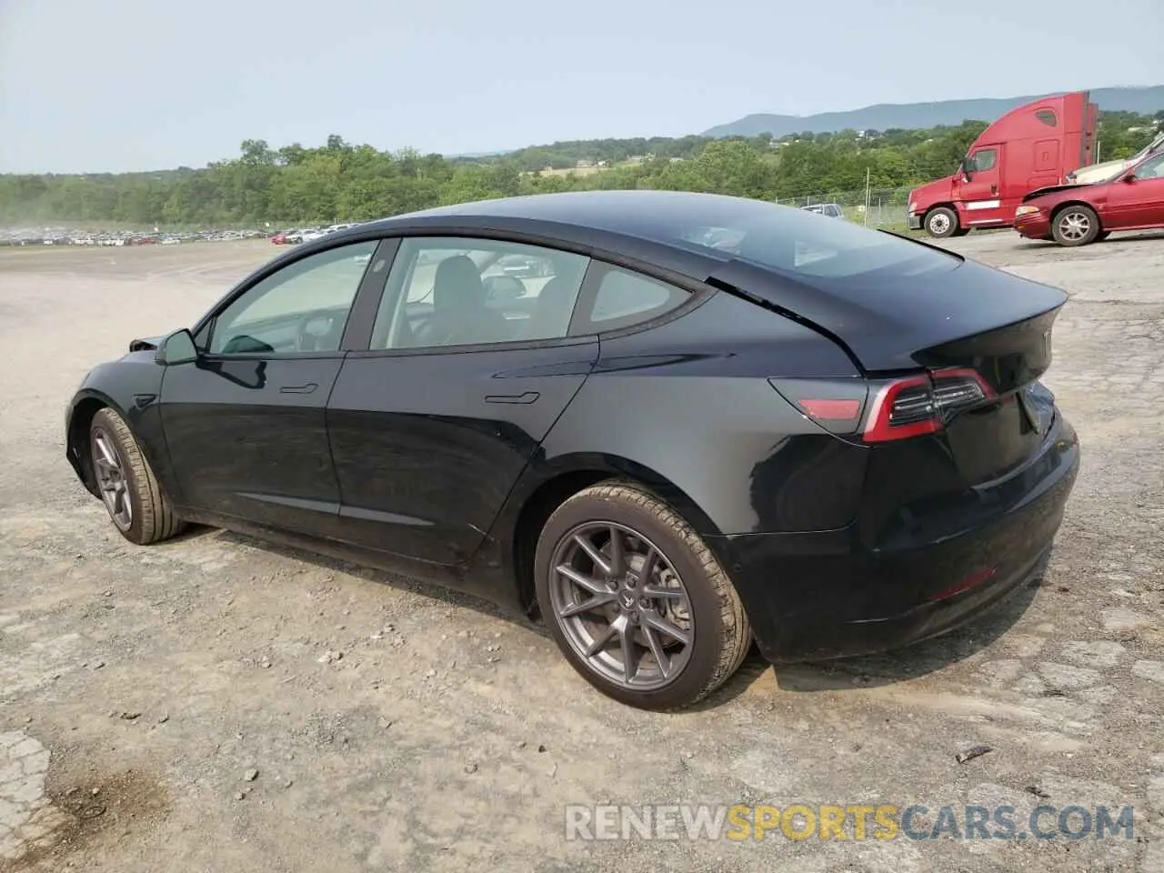 2 Photograph of a damaged car 5YJ3E1EB4NF334930 TESLA MODEL 3 2022