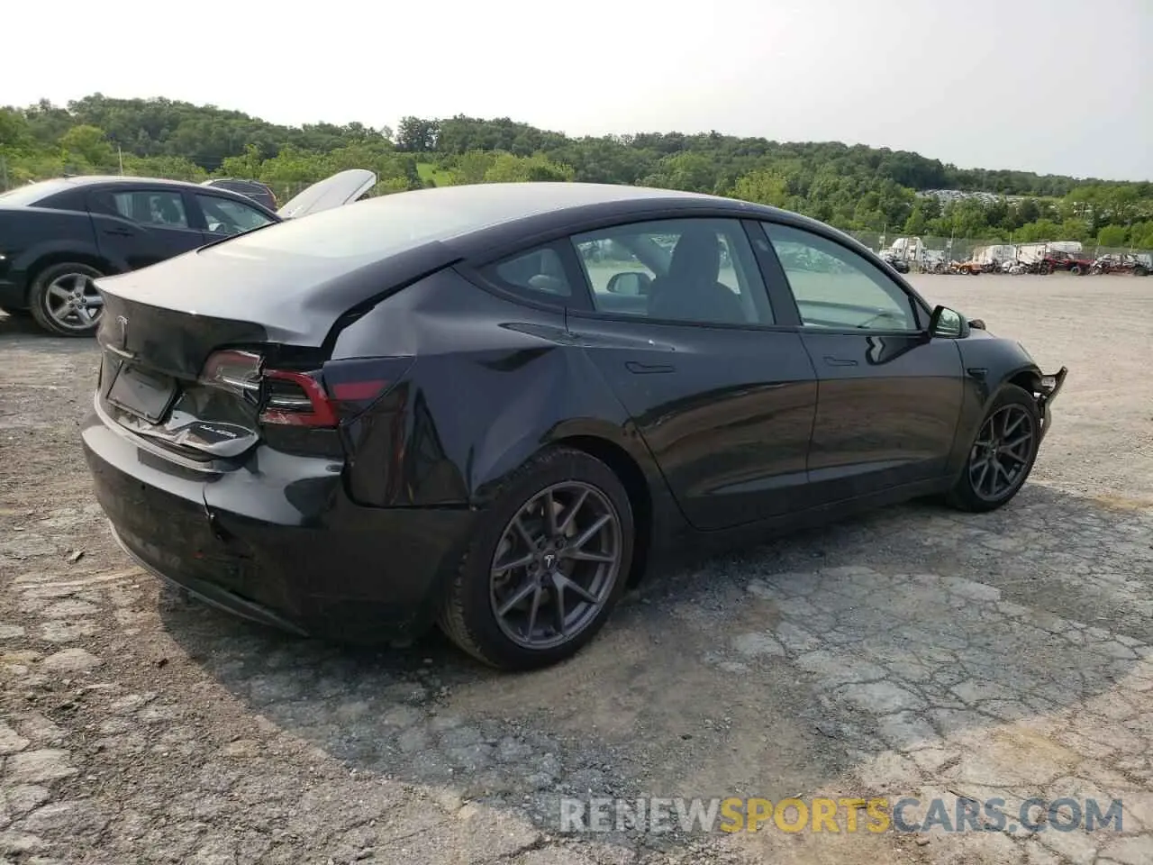3 Photograph of a damaged car 5YJ3E1EB4NF334930 TESLA MODEL 3 2022