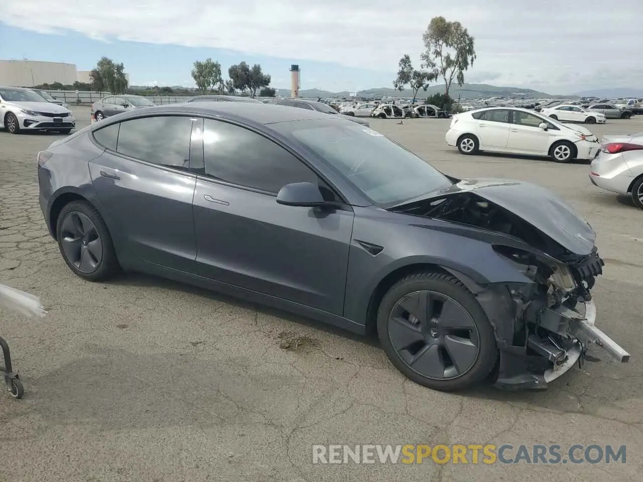 4 Фотография поврежденного автомобиля 5YJ3E1EB5NF135577 TESLA MODEL 3 2022