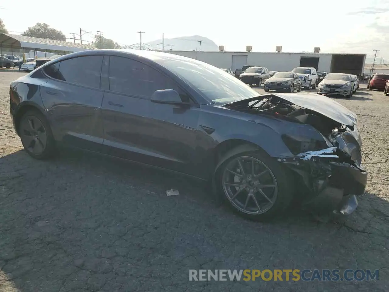 4 Photograph of a damaged car 5YJ3E1EB5NF221746 TESLA MODEL 3 2022