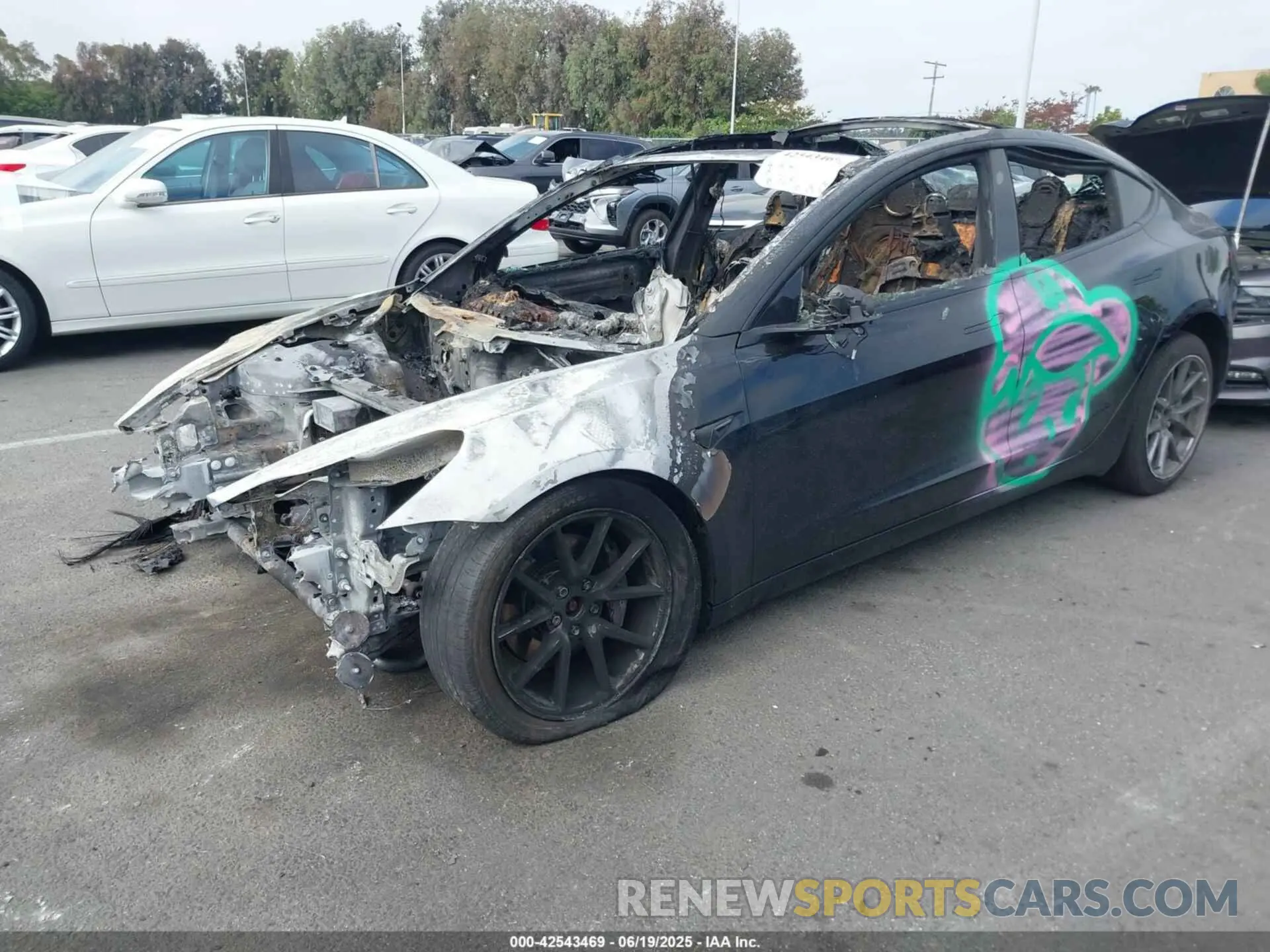 2 Photograph of a damaged car 5YJ3E1EB5NF263687 TESLA MODEL 3 2022