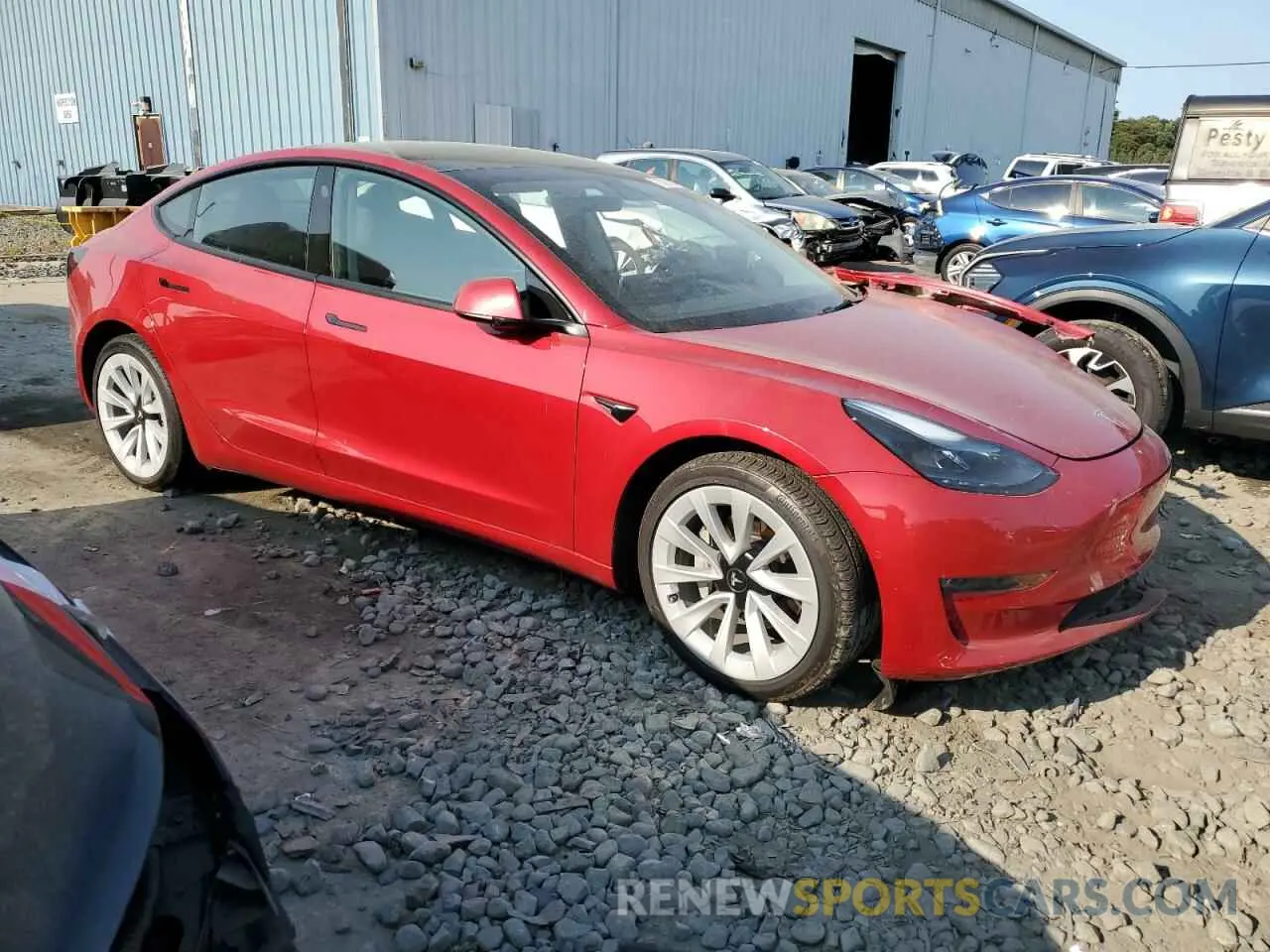 4 Photograph of a damaged car 5YJ3E1EB5NF266928 TESLA MODEL 3 2022