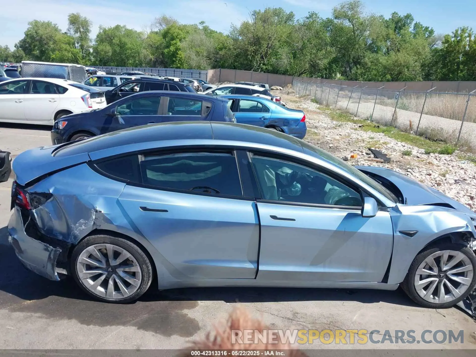 12 Photograph of a damaged car 5YJ3E1EB5NF270106 TESLA MODEL 3 2022