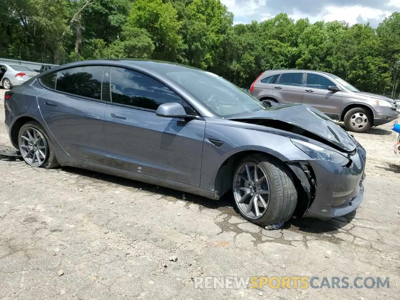4 Photograph of a damaged car 5YJ3E1EB5NF289139 TESLA MODEL 3 2022