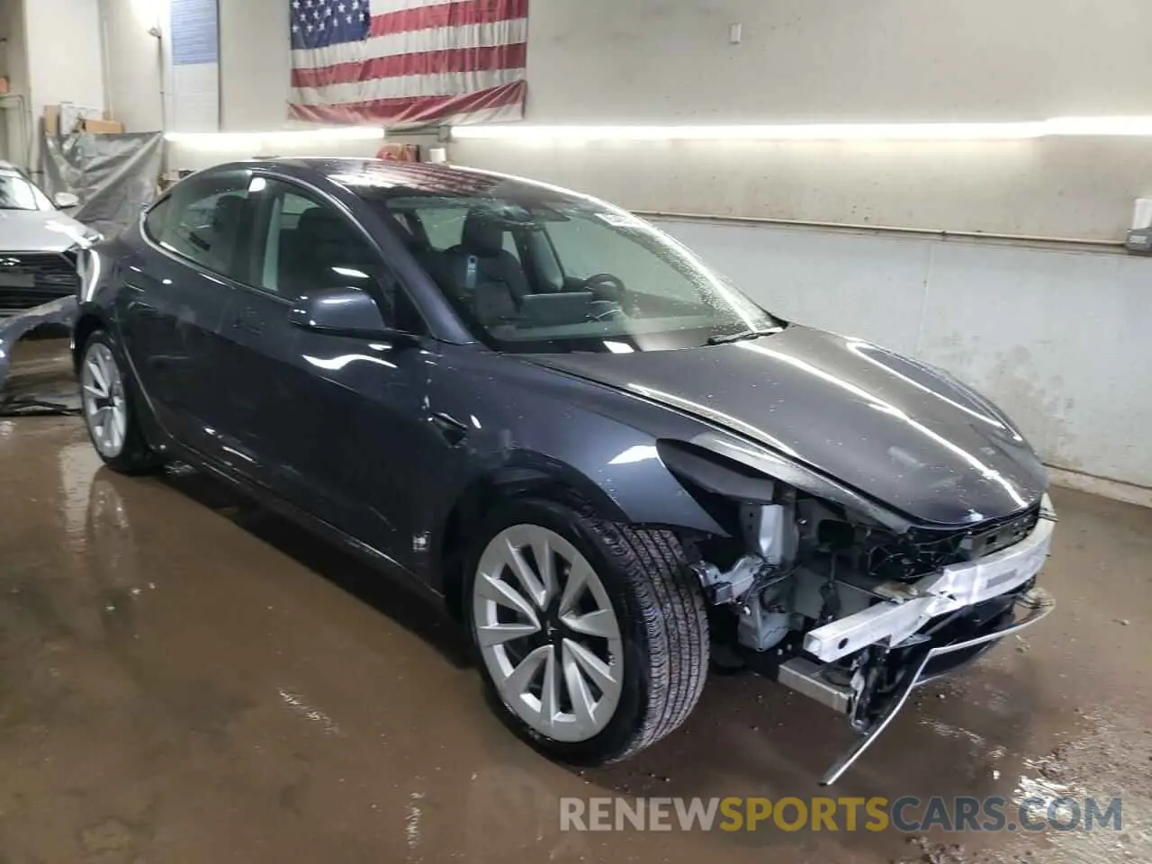 4 Photograph of a damaged car 5YJ3E1EB5NF317117 TESLA MODEL 3 2022