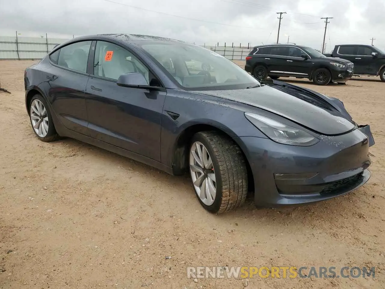 4 Photograph of a damaged car 5YJ3E1EB5NF330658 TESLA MODEL 3 2022