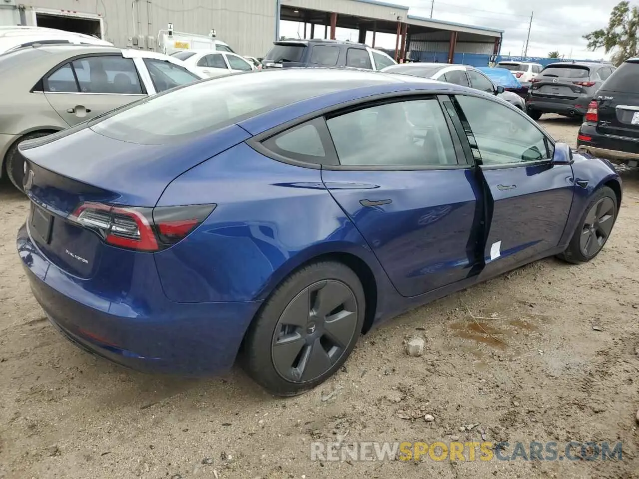 3 Photograph of a damaged car 5YJ3E1EB5NF334399 TESLA MODEL 3 2022