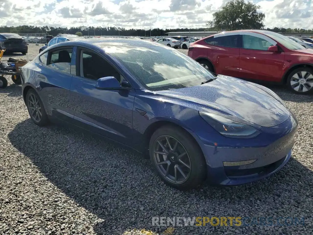 4 Фотография поврежденного автомобиля 5YJ3E1EB7NF103357 TESLA MODEL 3 2022
