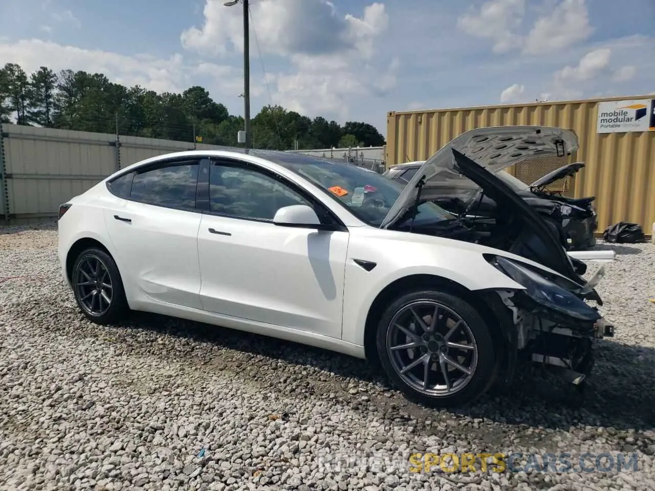 4 Photograph of a damaged car 5YJ3E1EB7NF105321 TESLA MODEL 3 2022