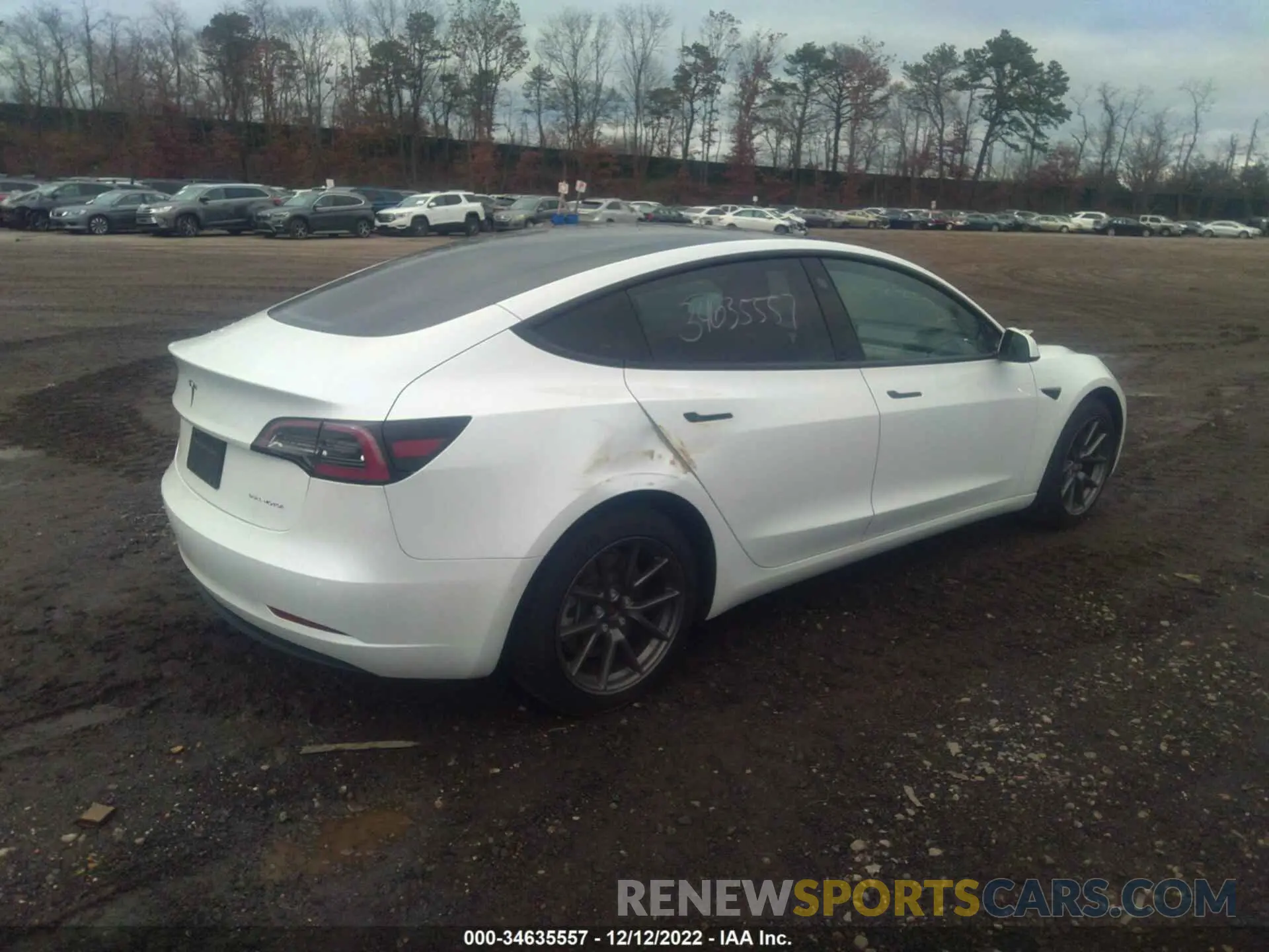 4 Photograph of a damaged car 5YJ3E1EB7NF111393 TESLA MODEL 3 2022