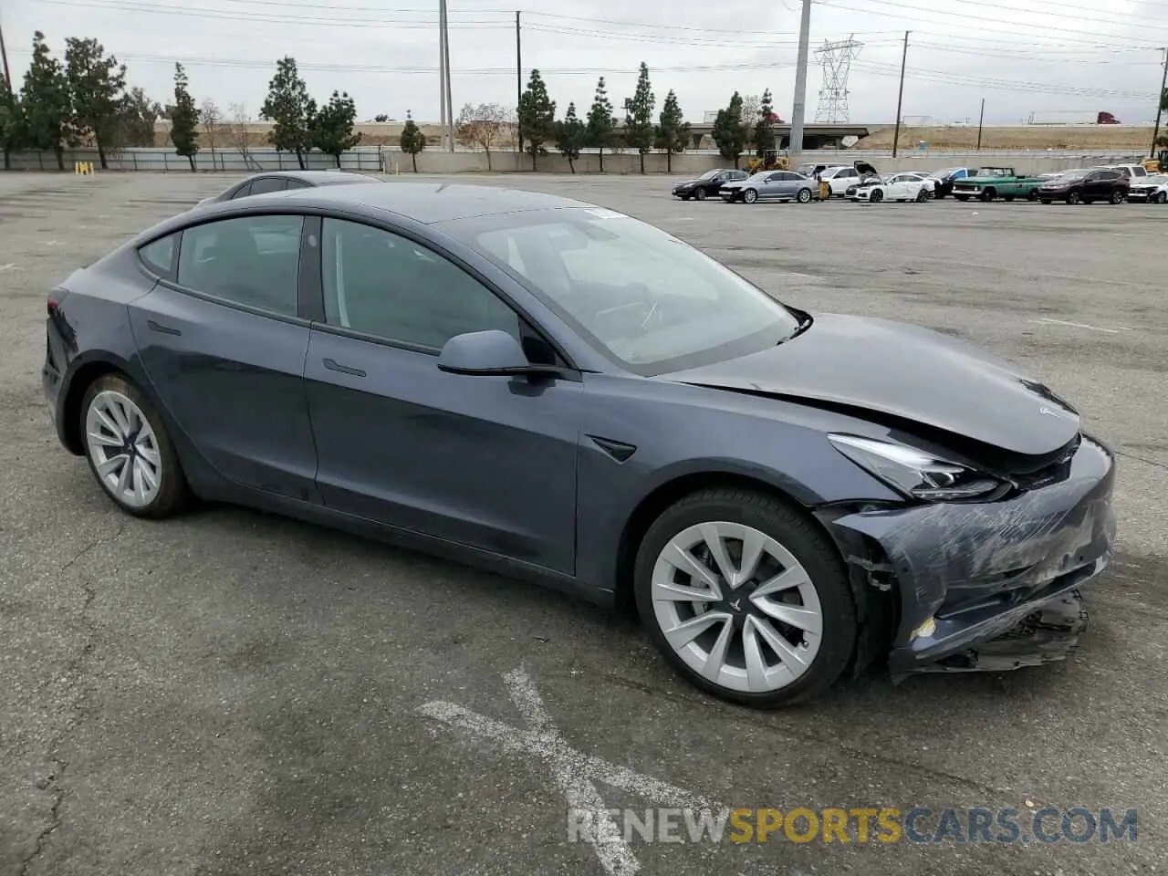 4 Фотография поврежденного автомобиля 5YJ3E1EB7NF131613 TESLA MODEL 3 2022