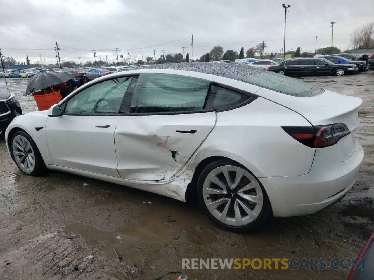 2 Photograph of a damaged car 5YJ3E1EB7NF143602 TESLA MODEL 3 2022